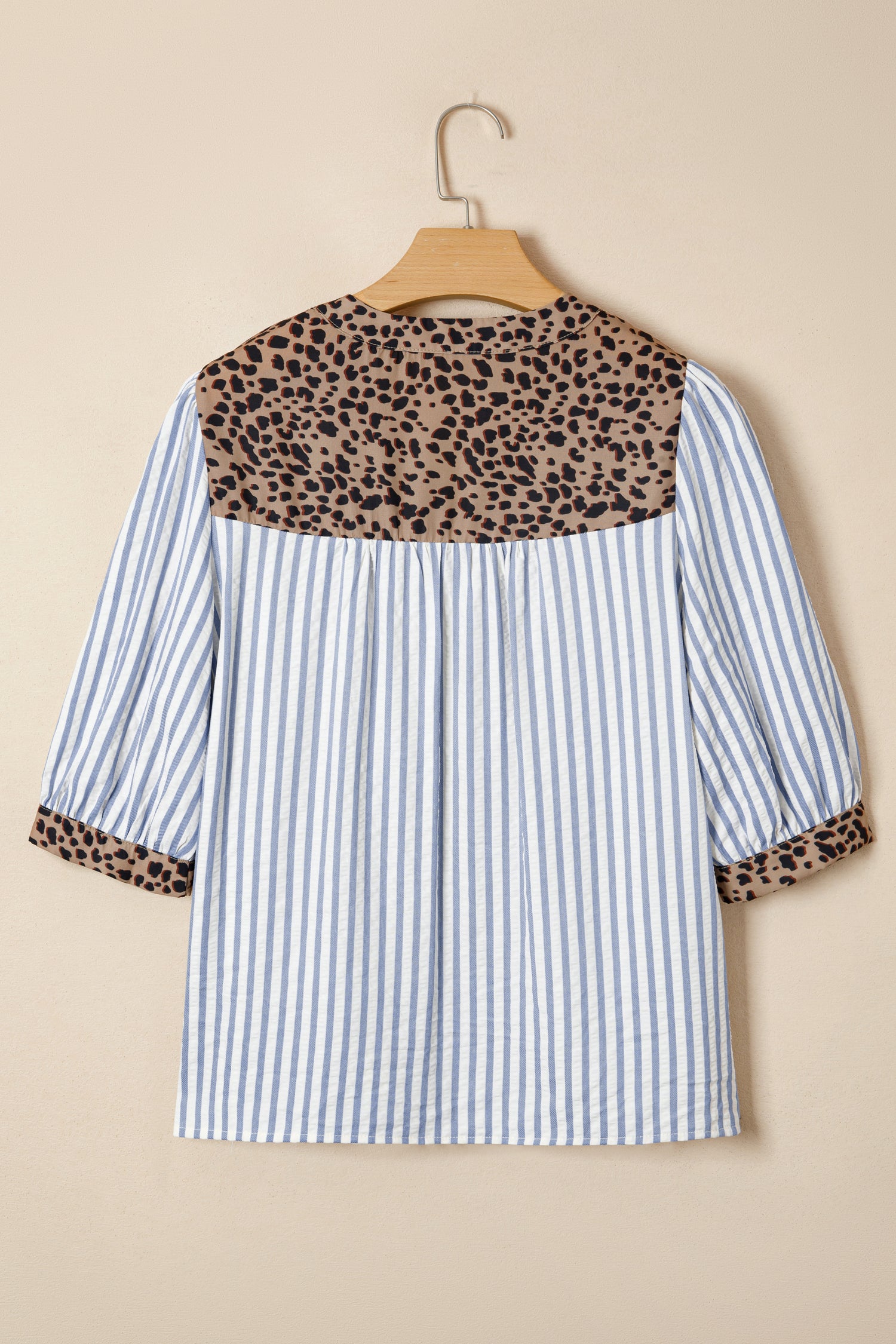 Sky blue striped blouse with leopard trim, V-neck, button-down, short sleeves, from Lavender Lane Clothing.