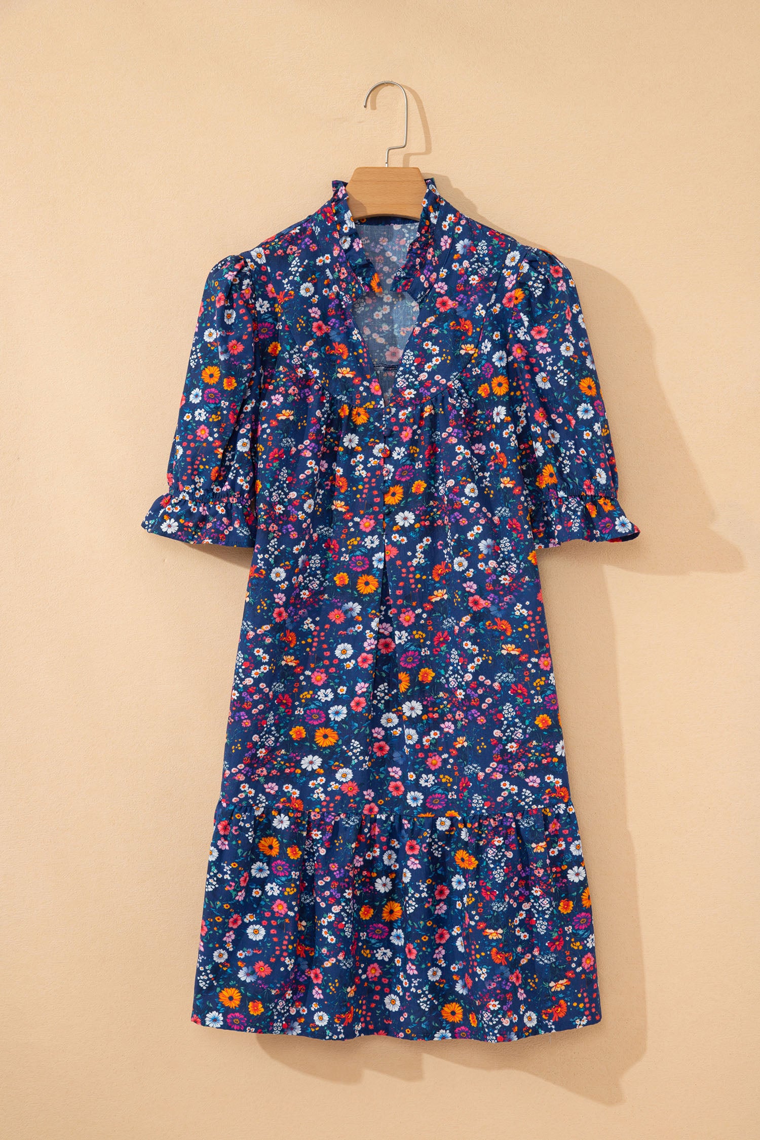 Blue Wild Daisy floral mini dress with split neckline and puff sleeves by Lavendar Lane Clothing, perfect for warm weather.