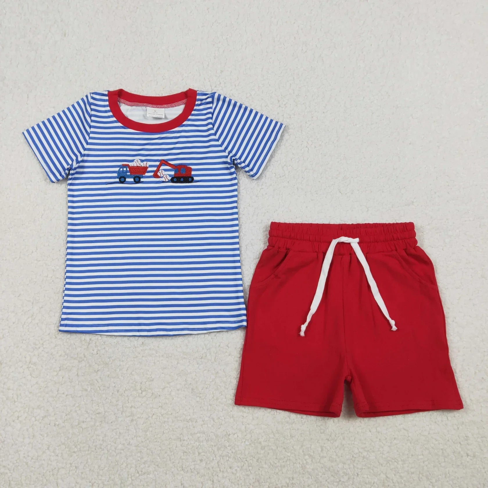 Boy's short sleeve shirt and shorts set in vibrant colors by Lavendar Lane Clothing, perfect for summer outings.