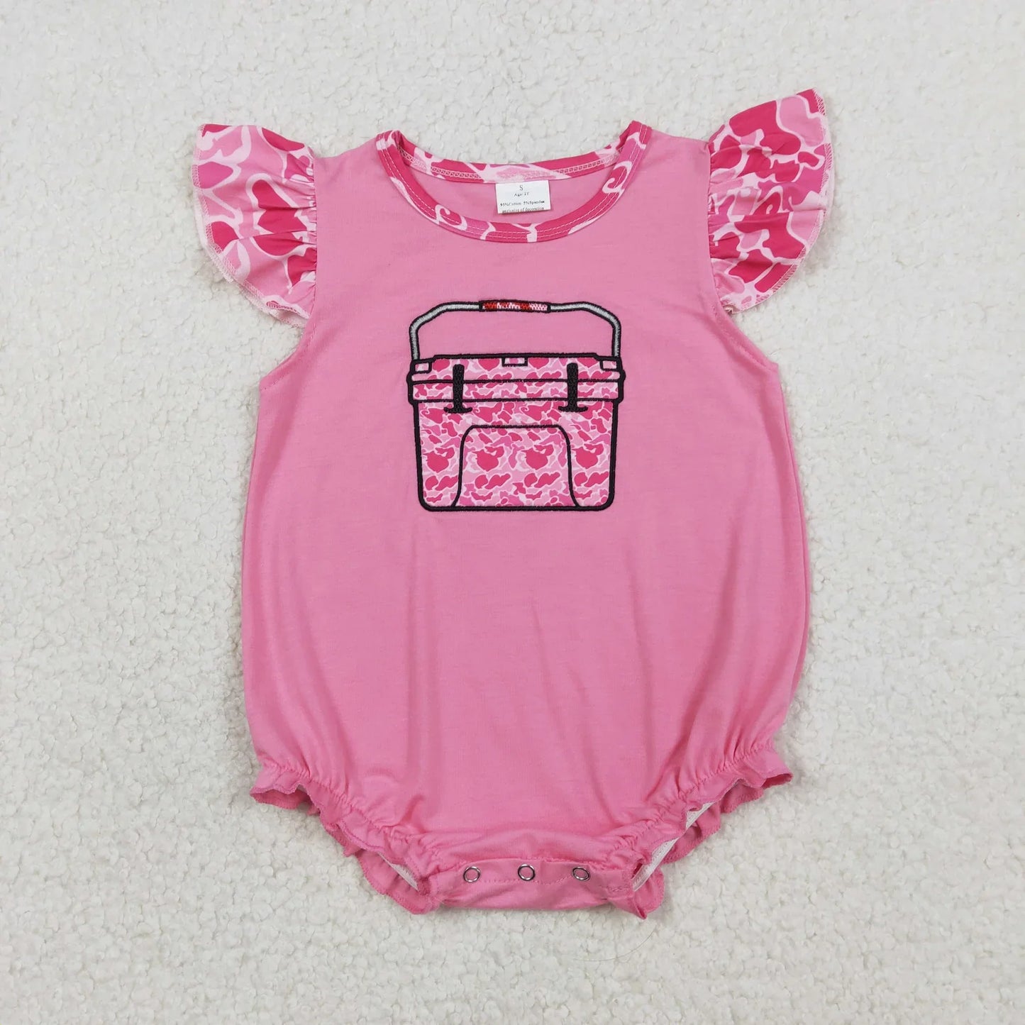 Girl's camo print romper by Lavendar Lane with embroidery, bows, and ruffles, showcasing a stylish design.