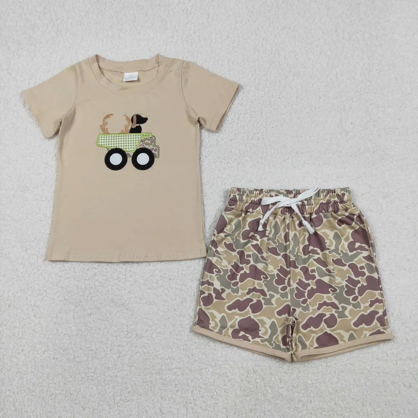 Boy's short sleeve shirt and shorts set in vibrant colors by Lavendar Lane Clothing, featuring playful patterns and comfortable fit.