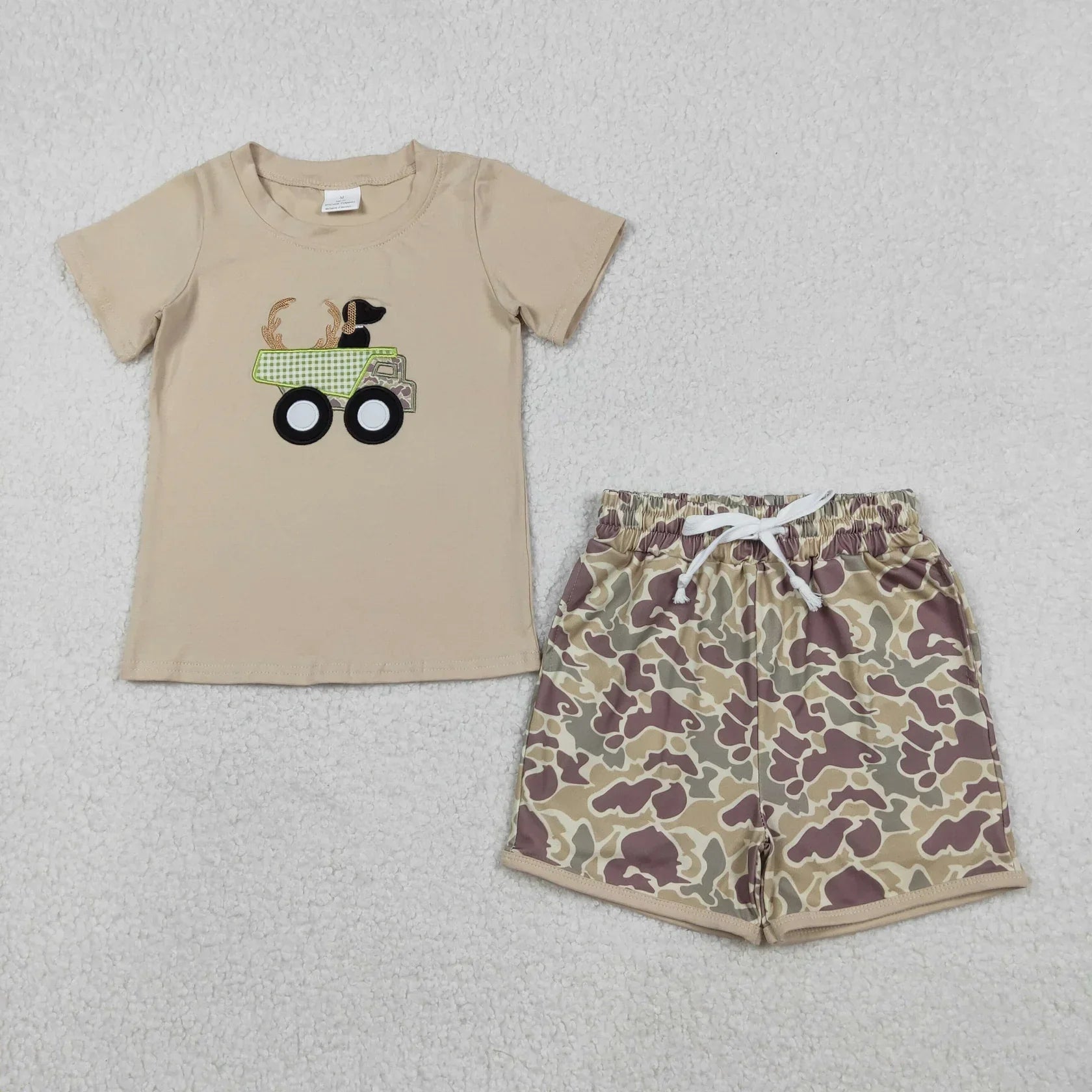 Boy's short sleeve shirt and shorts set in vibrant colors by Lavendar Lane Clothing, featuring playful patterns and comfortable fit.