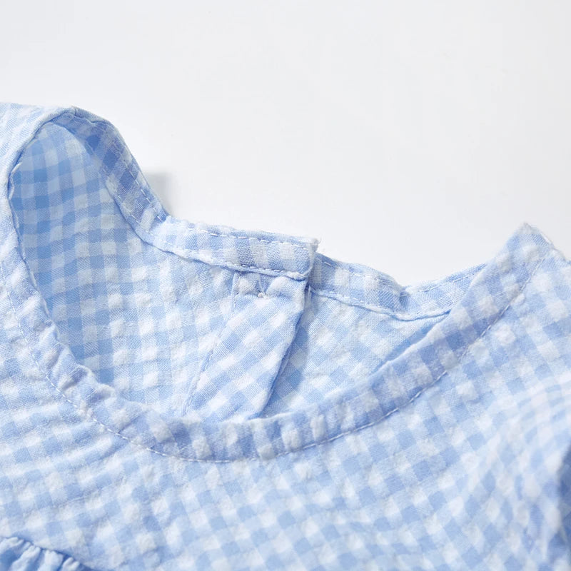 Girl's cotton dress by Lavendar Lane Clothing featuring a lattice design and duck print, perfect for casual wear.