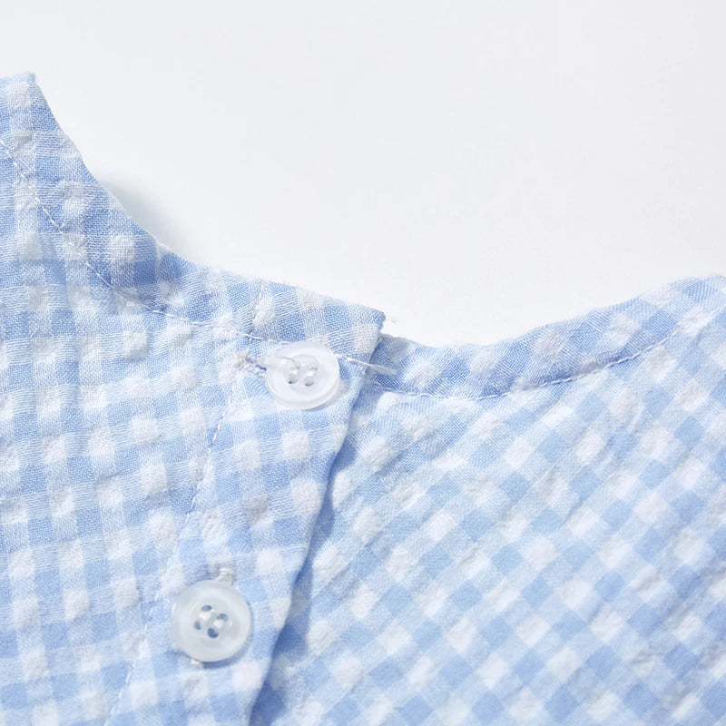 Girl's cotton dress by Lavendar Lane Clothing featuring a lattice design and duck print, perfect for playful outings.