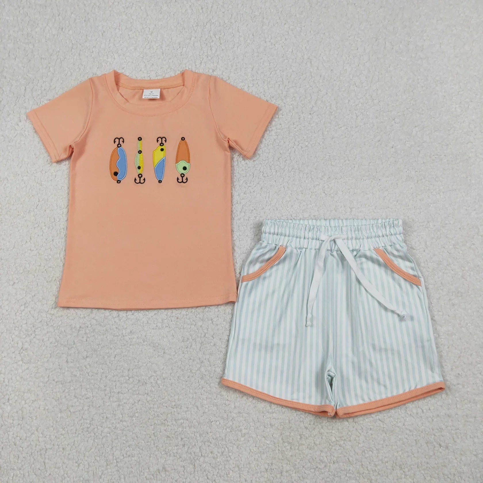 Lavendar Lane Clothing boy's short sleeve shorts set featuring a colorful design and comfortable fit for summer wear.