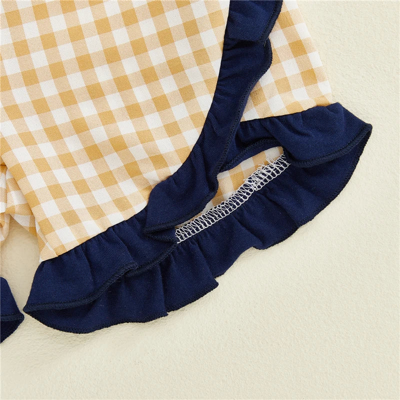Toddler girl's summer 2-piece outfit with dog embroidery tops and plaid shorts from Lavendar Lane Clothing, featuring flying sleeve design.