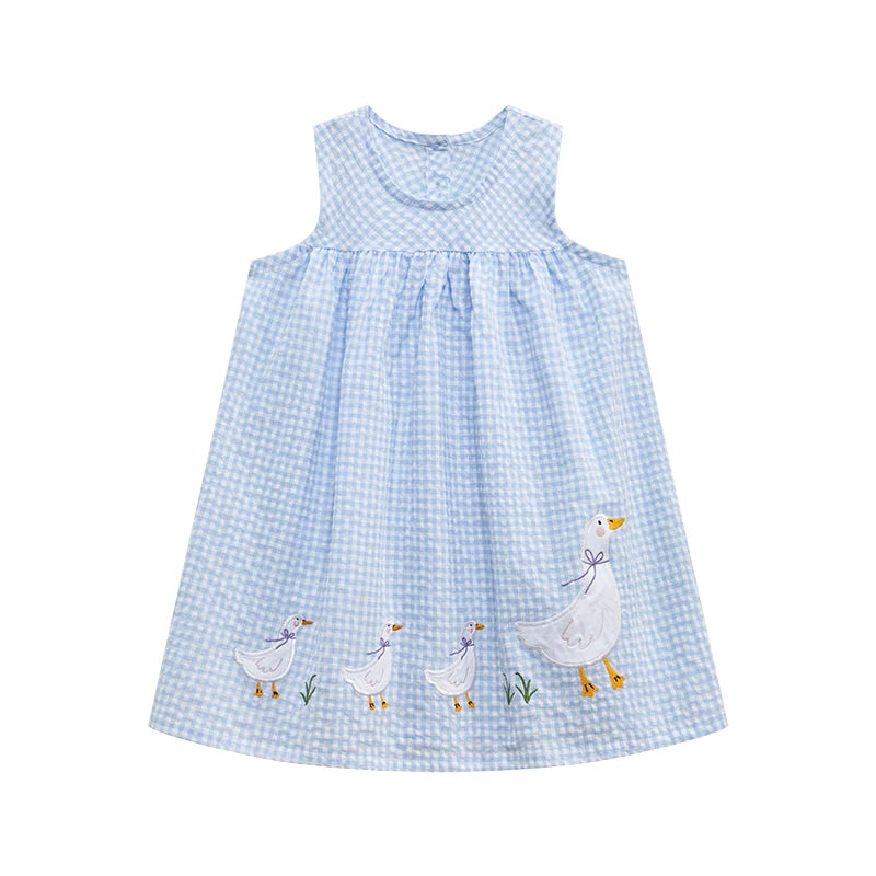 Girl's cotton dress by Lavendar Lane Clothing featuring a lattice design and duck print on a light background.