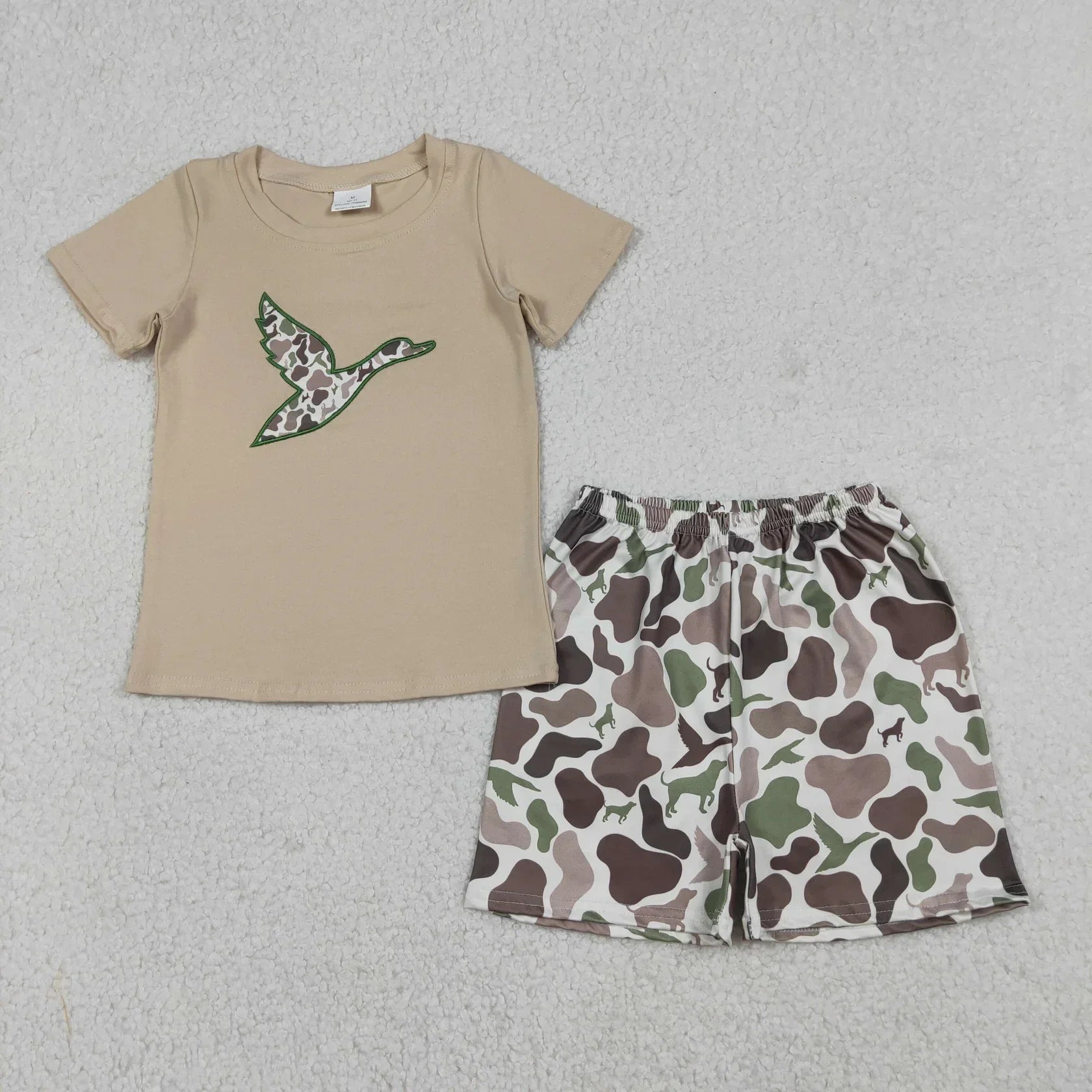 Lavendar Lane Clothing boy's short sleeve set featuring a colorful design and matching shorts.