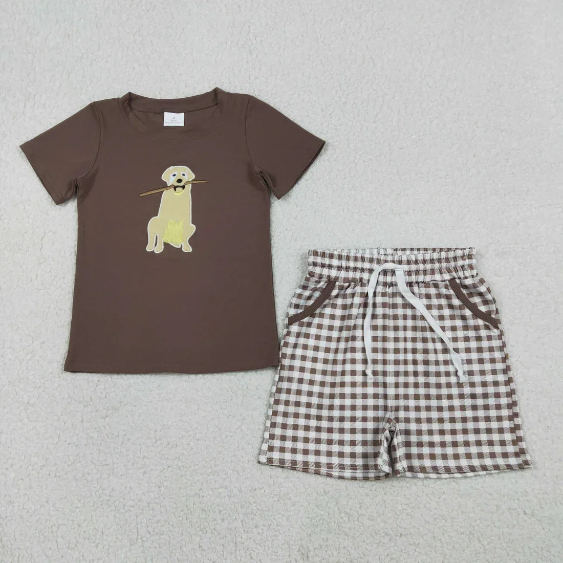 Lavendar Lane Clothing boy's short sleeve set featuring a colorful design and comfortable shorts for casual play.