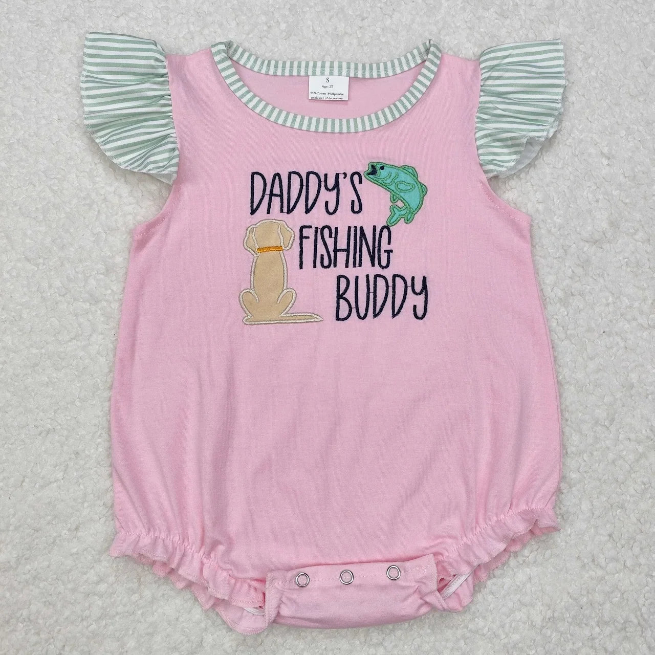 Girl's camo print romper by Lavendar Lane Clothing featuring embroidery, bows, and ruffles.