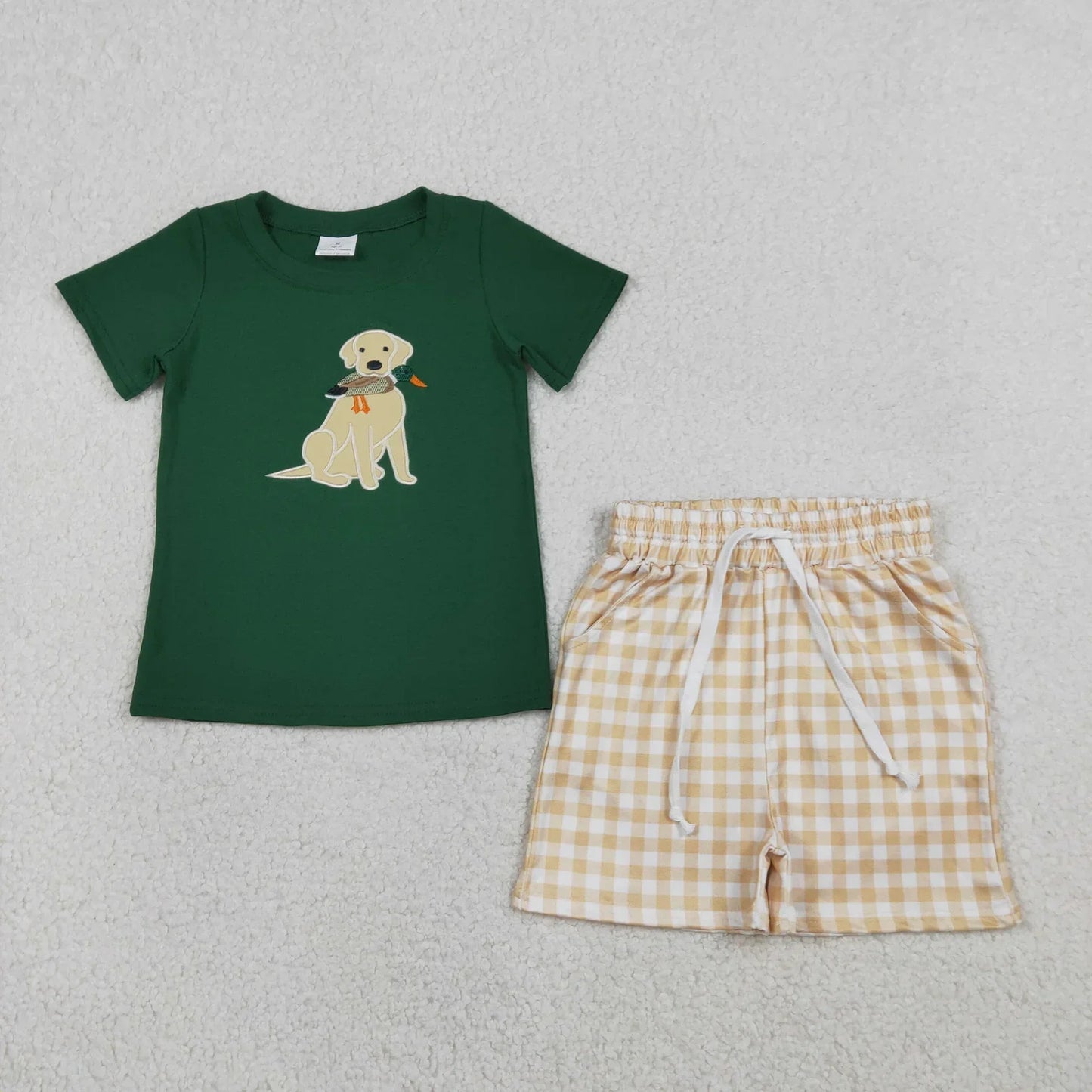 Boy's short sleeve shirt and shorts set from Lavendar Lane Clothing in vibrant colors and playful patterns.