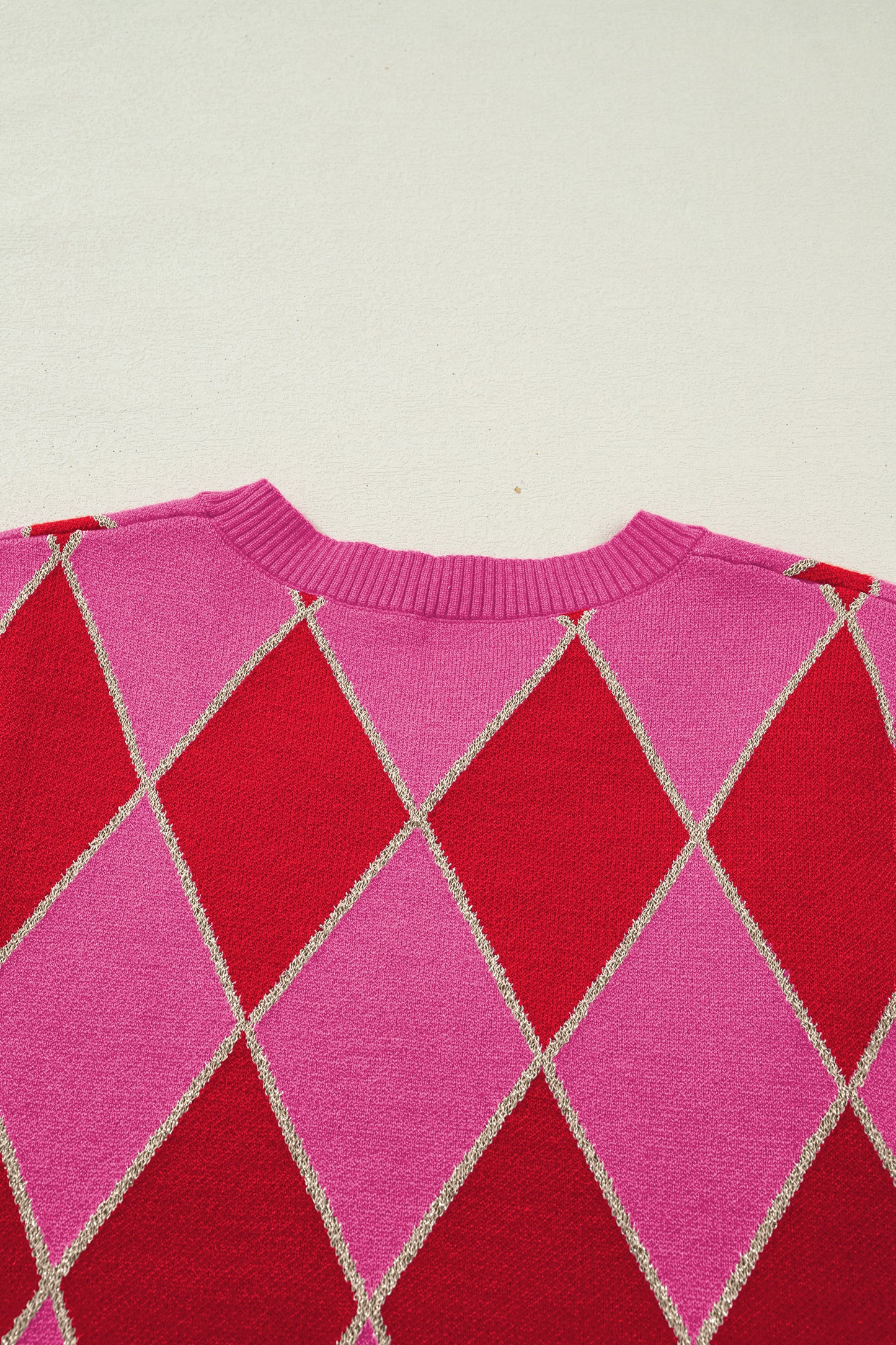 Lavendar Lane Clothing rose glitter trim rhombus pattern knit sweater vest, featuring sparkly pink accents and a cozy fit.