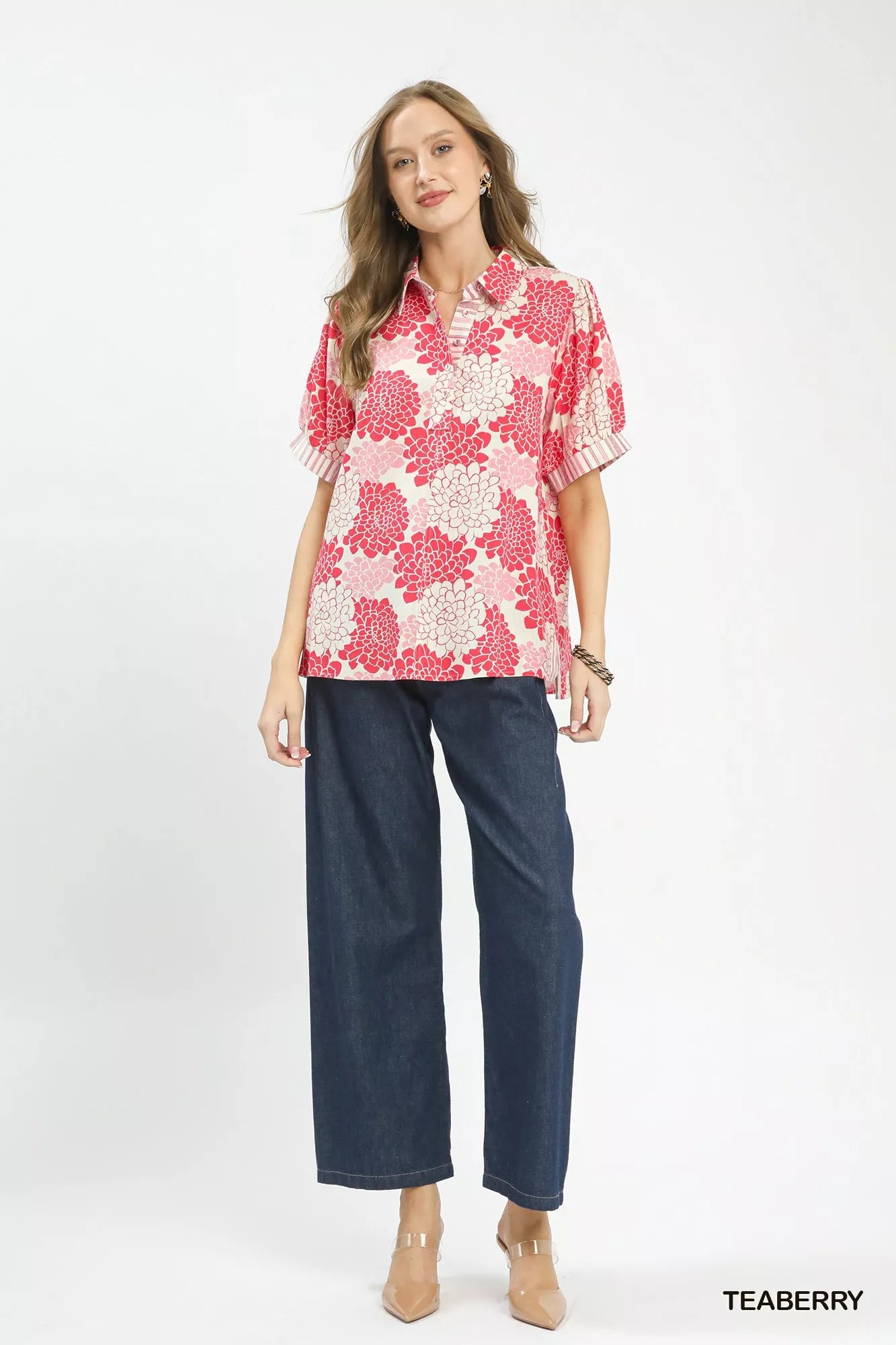 Lavendar Lane Clothing floral collared short sleeve blouse with a feminine design and vibrant floral pattern.