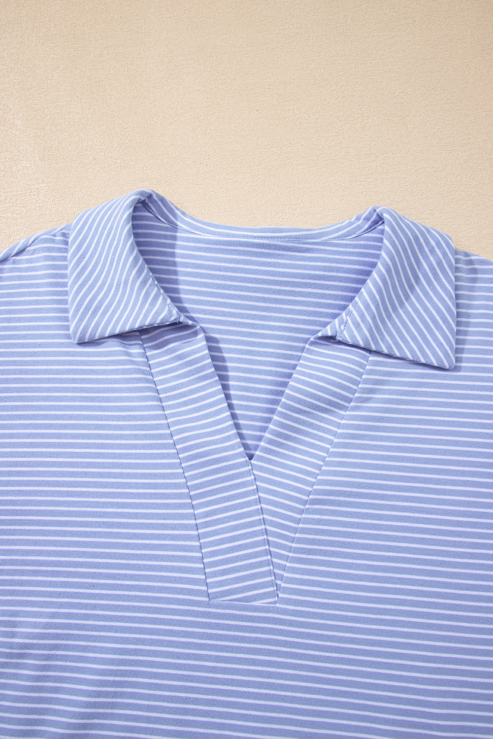 Sky blue stripe dolman sleeve polo shirt and matching drawstring shorts set by Lavender Lane Clothing, casual summer two-piece outfit.