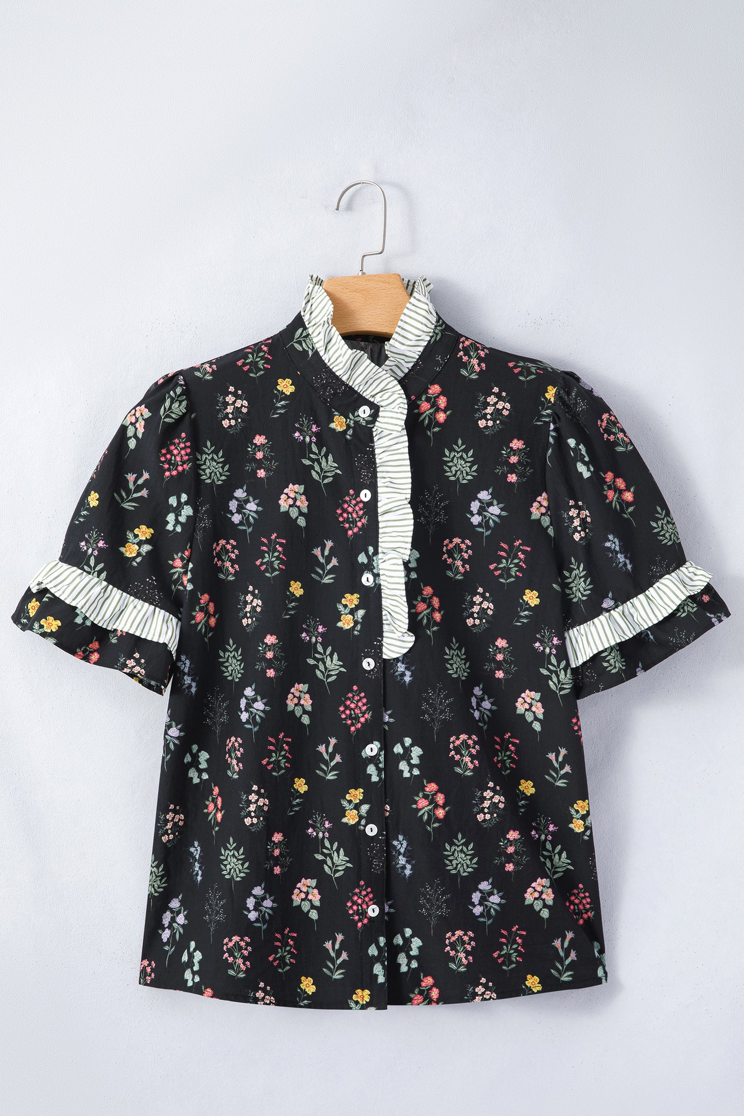Black floral short sleeve blouse with contrast frilled trim from Lavendar Lane Clothing, featuring a feminine, stylish design.