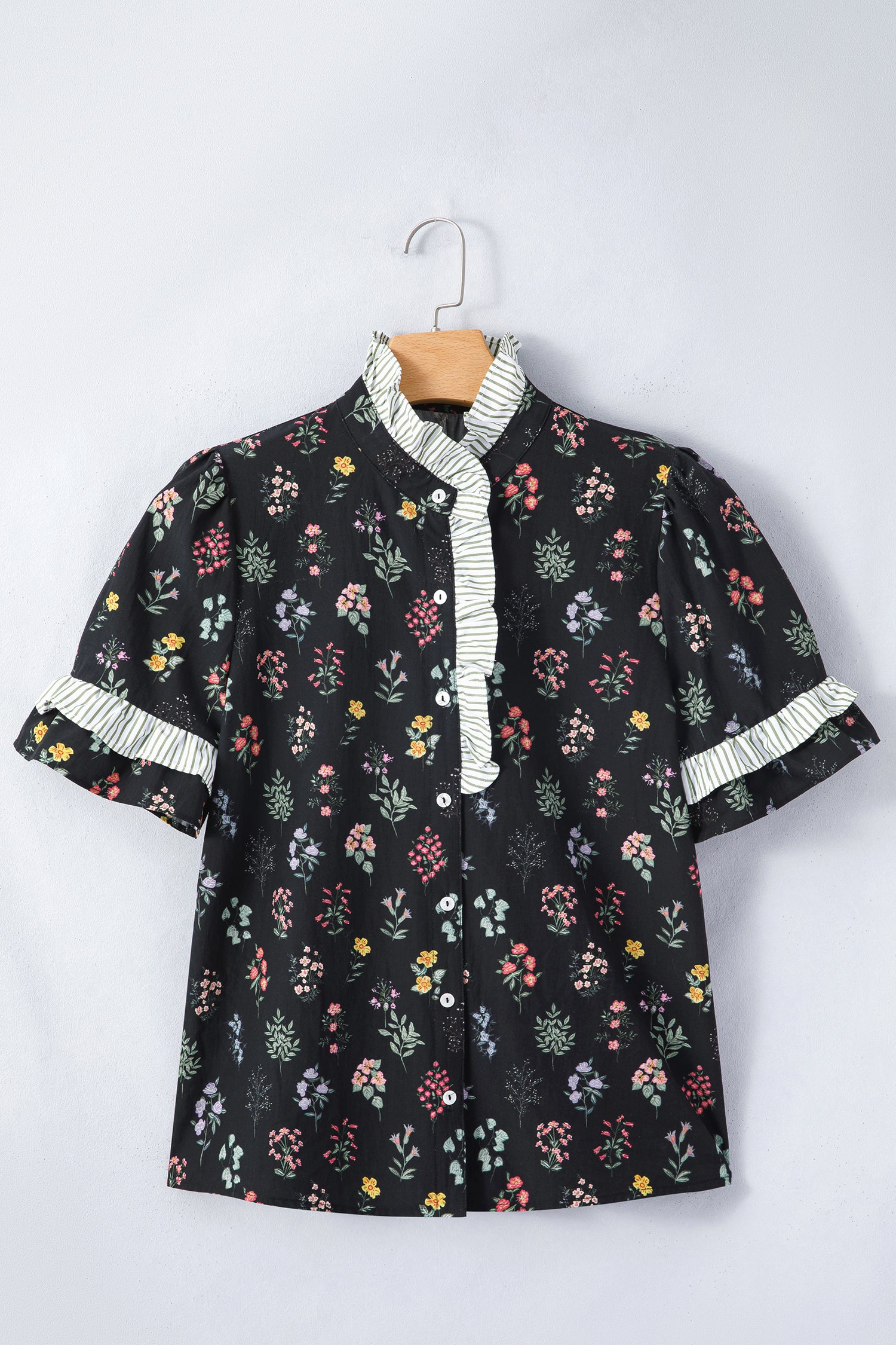 Black floral short sleeve blouse with contrast frilled trim from Lavendar Lane Clothing, featuring a feminine, stylish design.