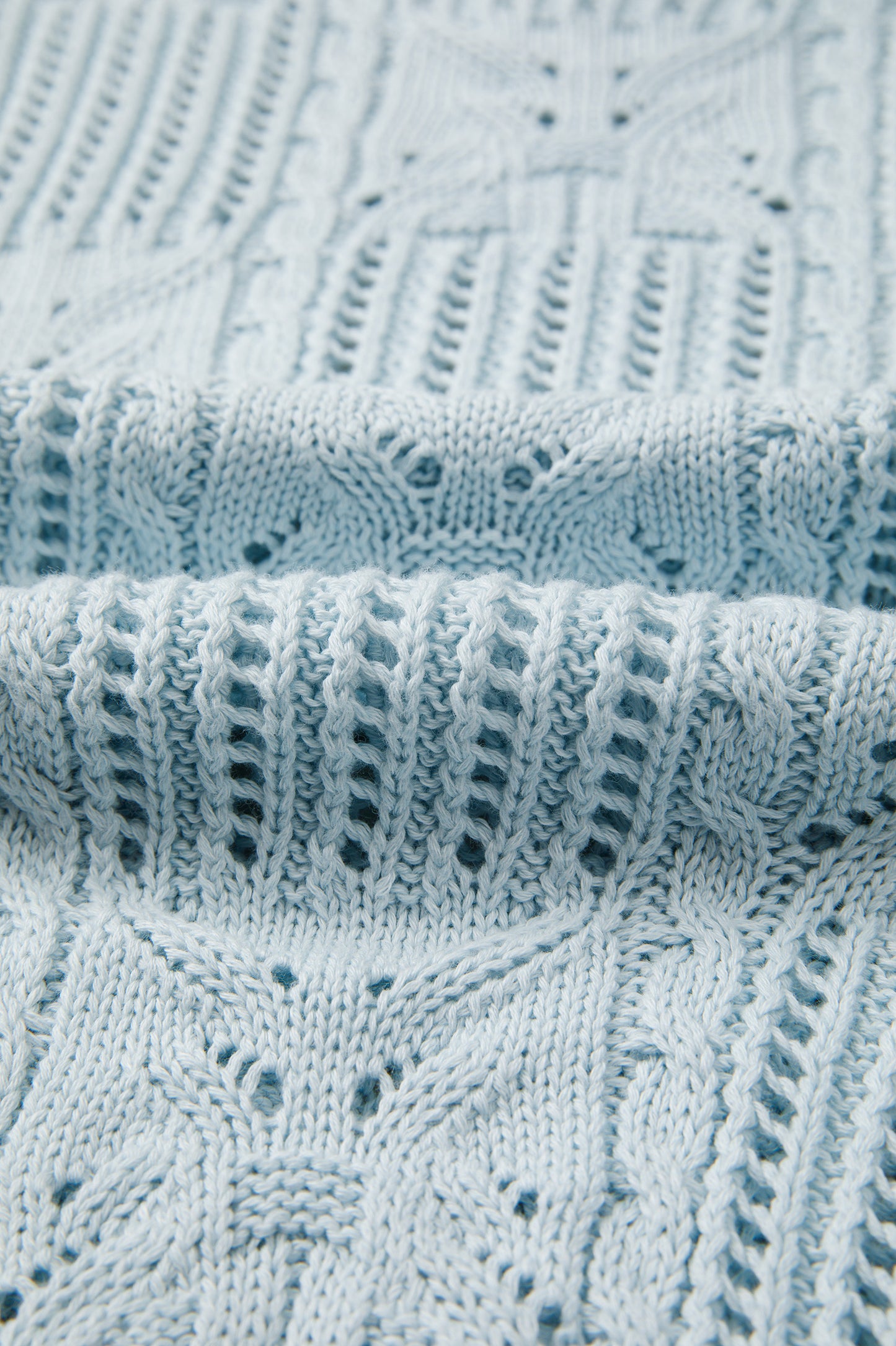 Lavendar Lane Blue Pointelle knit short sleeve sweater with scalloped trim, featuring a patterned design and cozy, stylish fit.