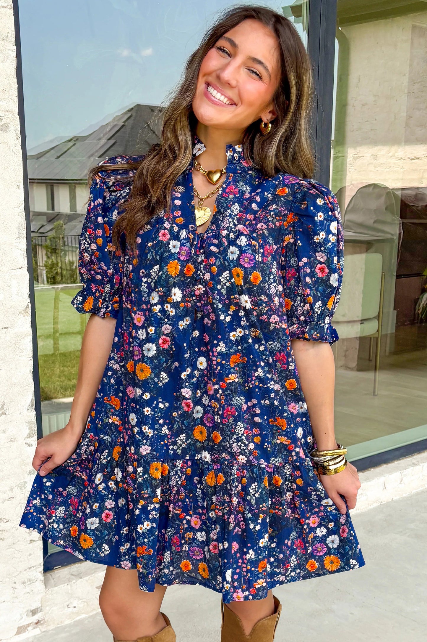 Blue Wild Daisy floral mini dress by Lavendar Lane Clothing featuring a split neck and short puff sleeves.