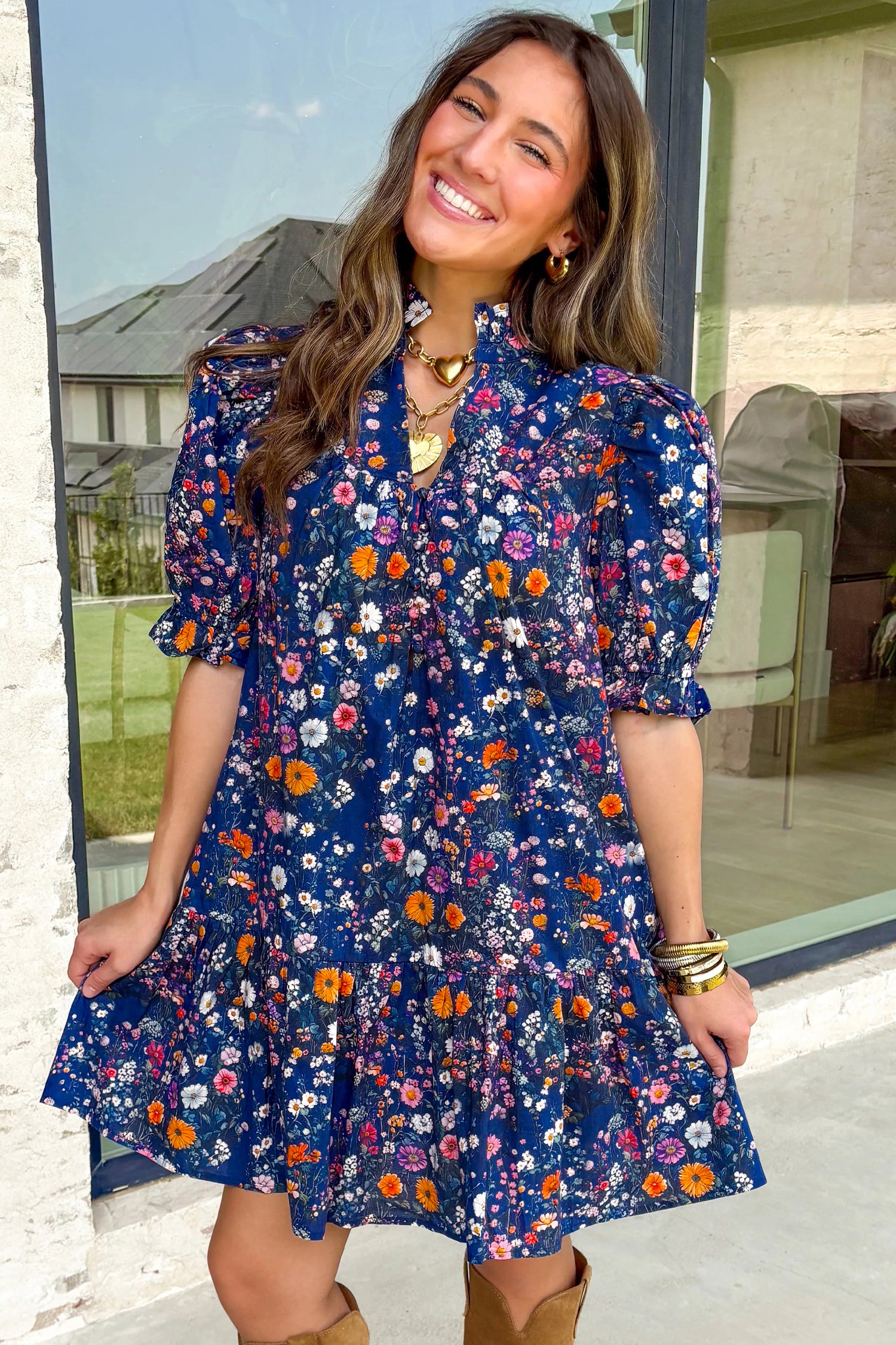 Blue Wild Daisy floral mini dress by Lavendar Lane Clothing featuring a split neck and short puff sleeves.