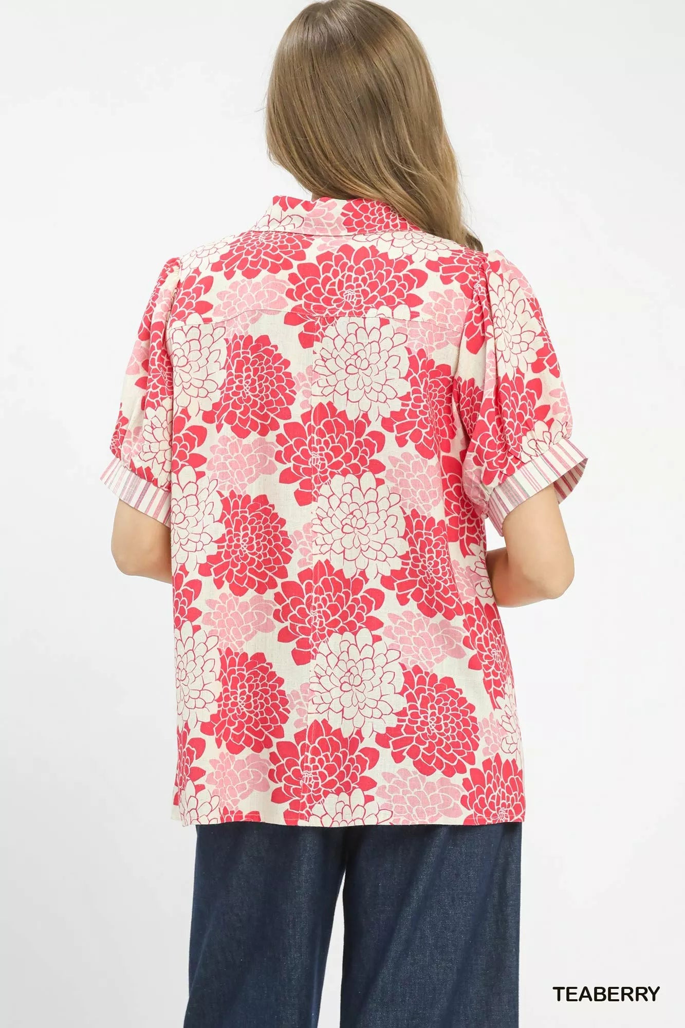 Floral collared short sleeve blouse from Lavender Lane Clothing with a colorful floral pattern and relaxed fit.