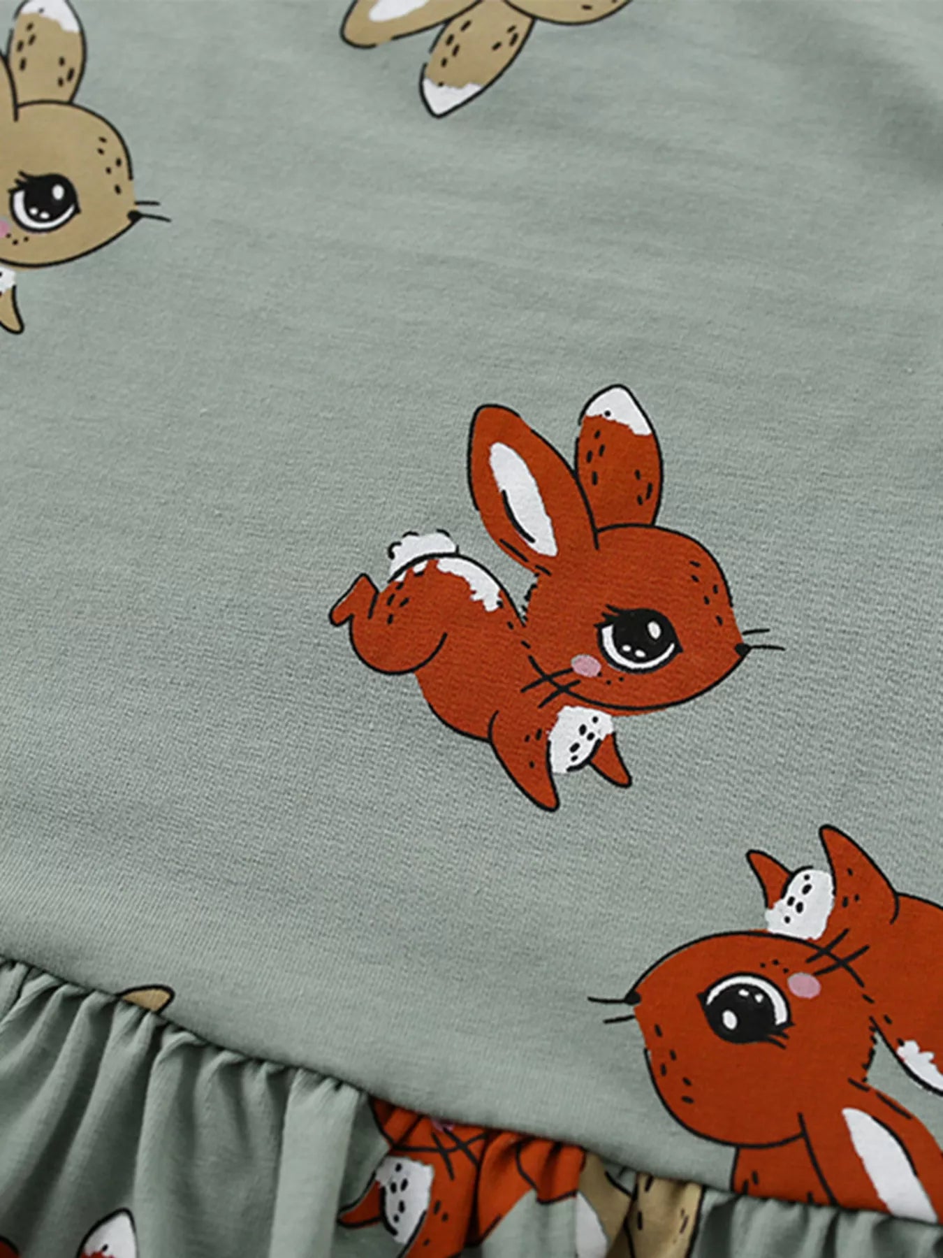 Children's cute cartoon print tiered dress by Lavender Lane Clothing, featuring colorful layered fabric and playful design.