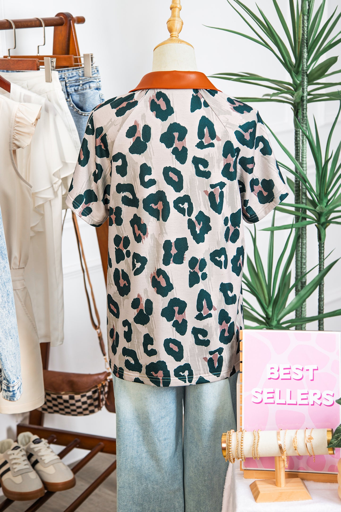 Lavendar Lane leopard print short sleeve blouse with contrast collar, button front, casual and unique fashion top.