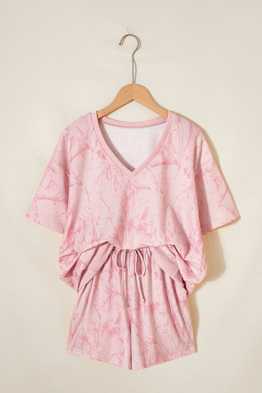 Pink abstract print V-neck loose tee and drawstring shorts, Lavendar Lane Clothing two-piece casual set for women.