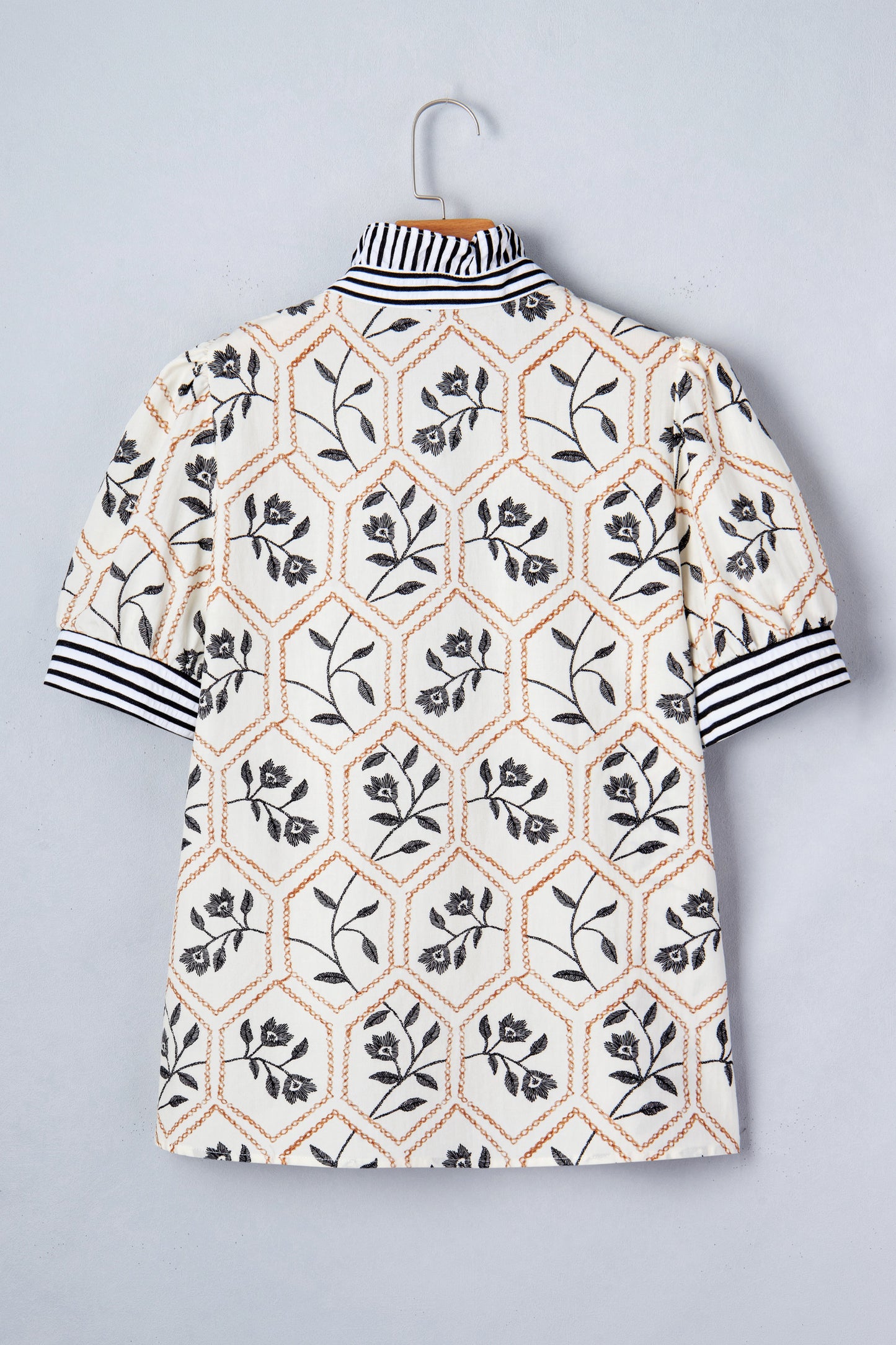 White floral print striped patchwork blouse with button neck and short sleeves by Lavender Lane Clothing.