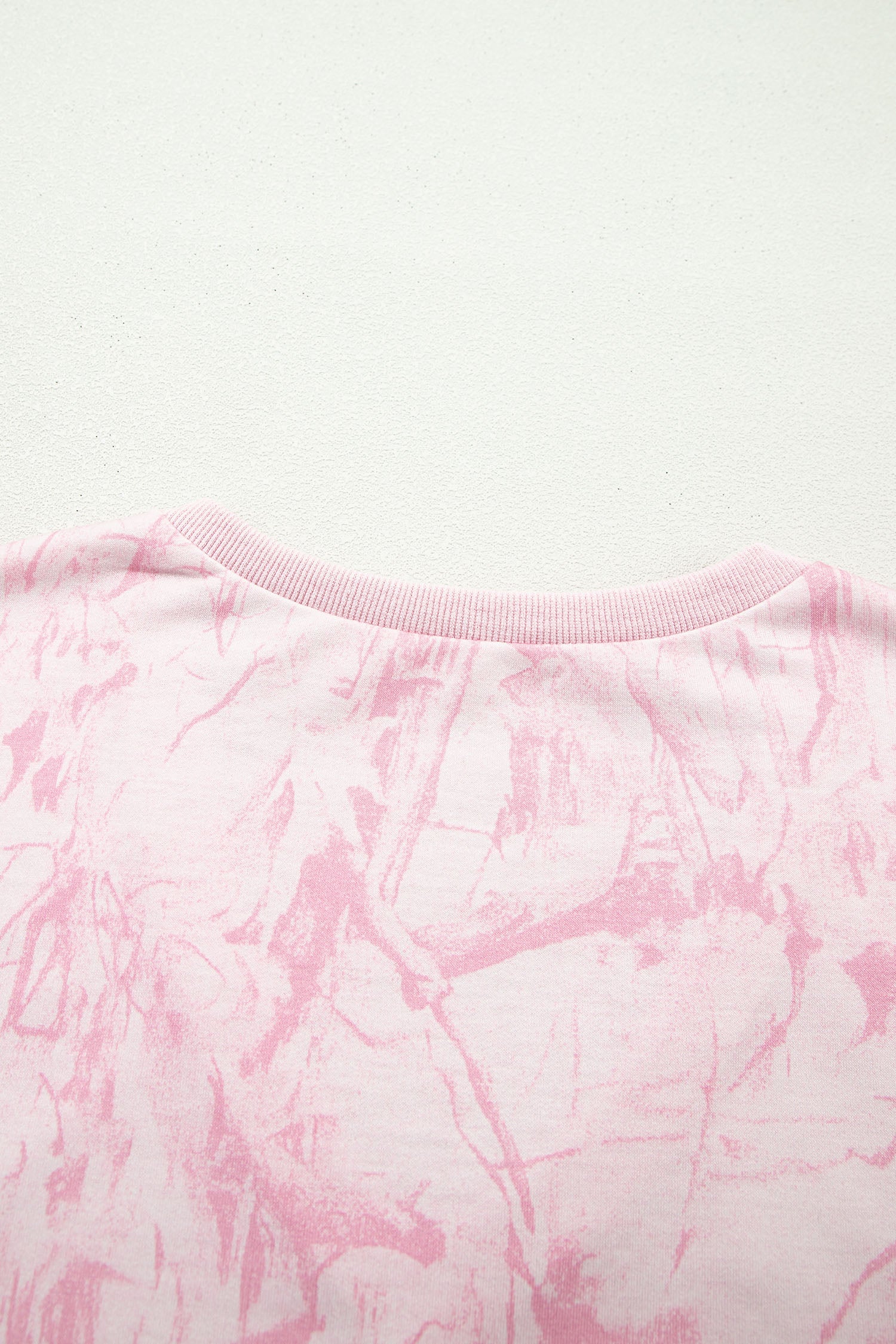 Pink abstract print V-neck loose tee and drawstring shorts two-piece set by Lavendar Lane Clothing, casual summer outfit.