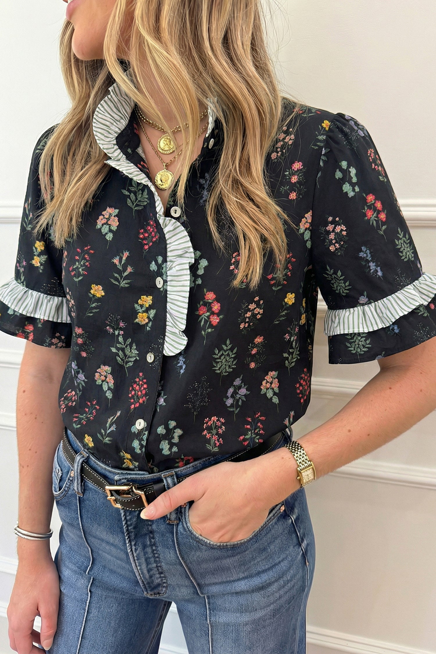 Black floral blouse with contrast frilled trim short sleeves from Lavendar Lane Clothing, showcasing a stylish, feminine top.