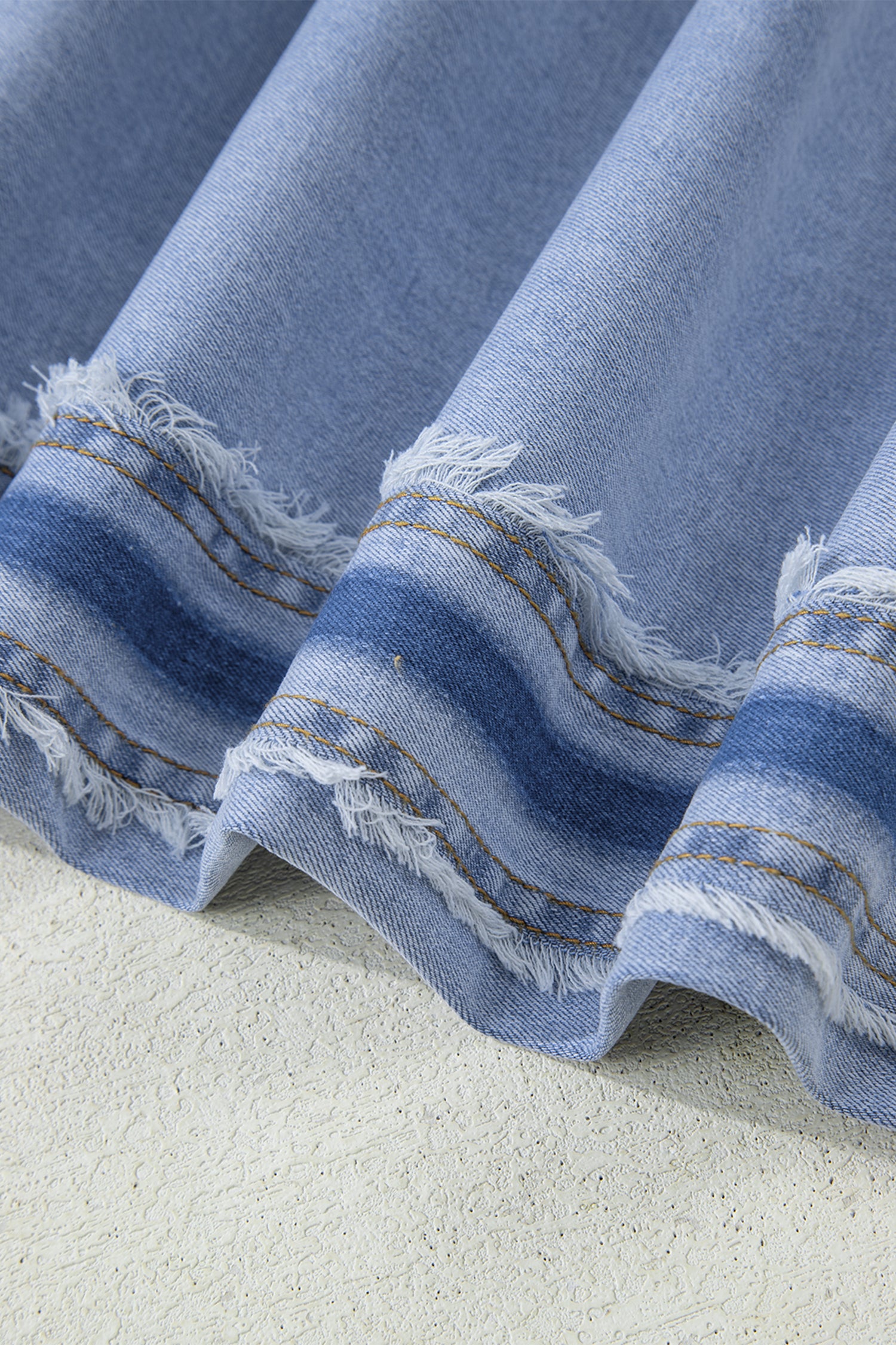 Lavendar Lane Clothing Beau Blue contrast stripe frayed side panel patchwork shift jeans showing stylish denim with colorful stripe details.