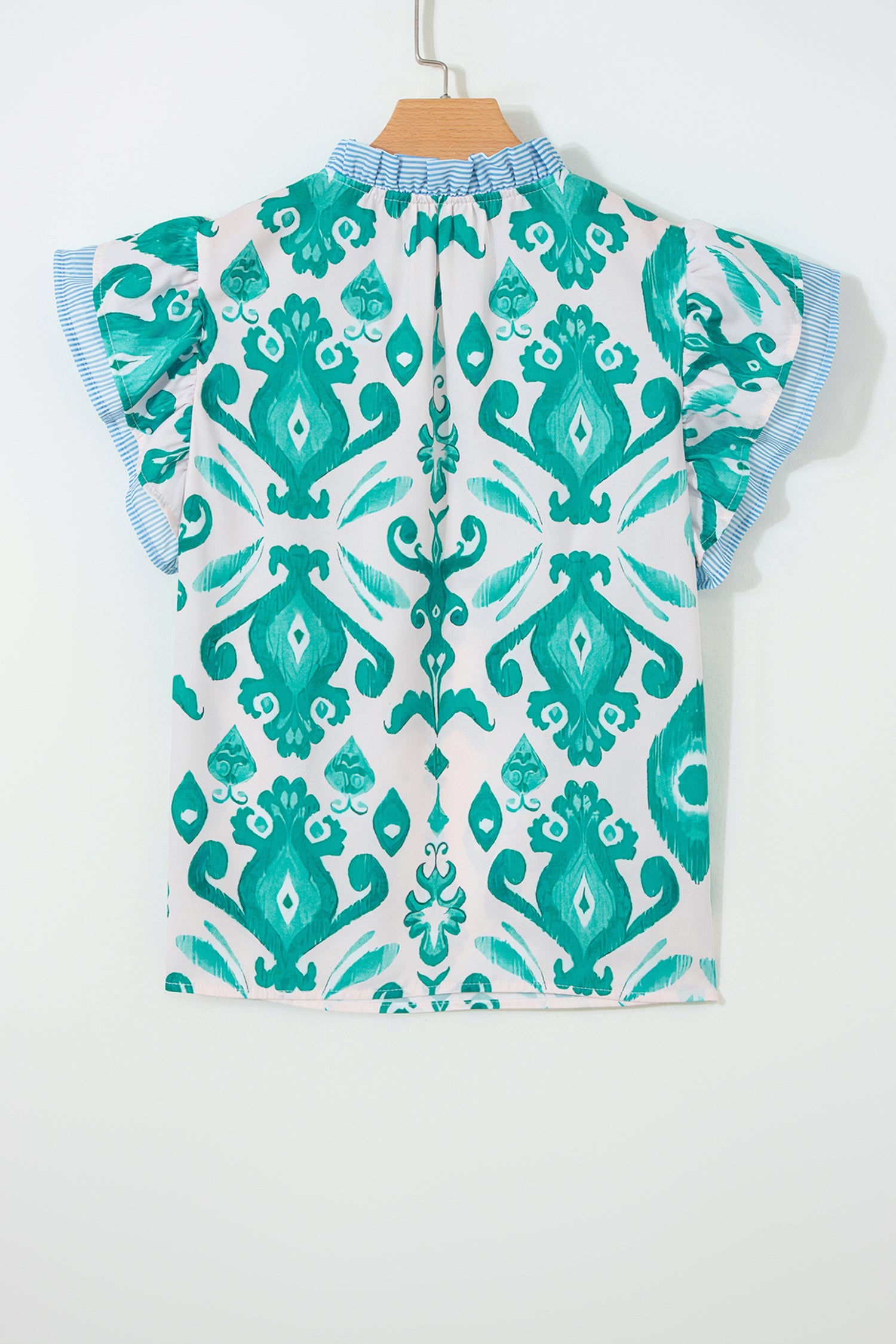 Sky blue ethnic print striped trim flutter sleeve top by Lavendar Lane Clothing, featuring a relaxed fit and lightweight fabric.
