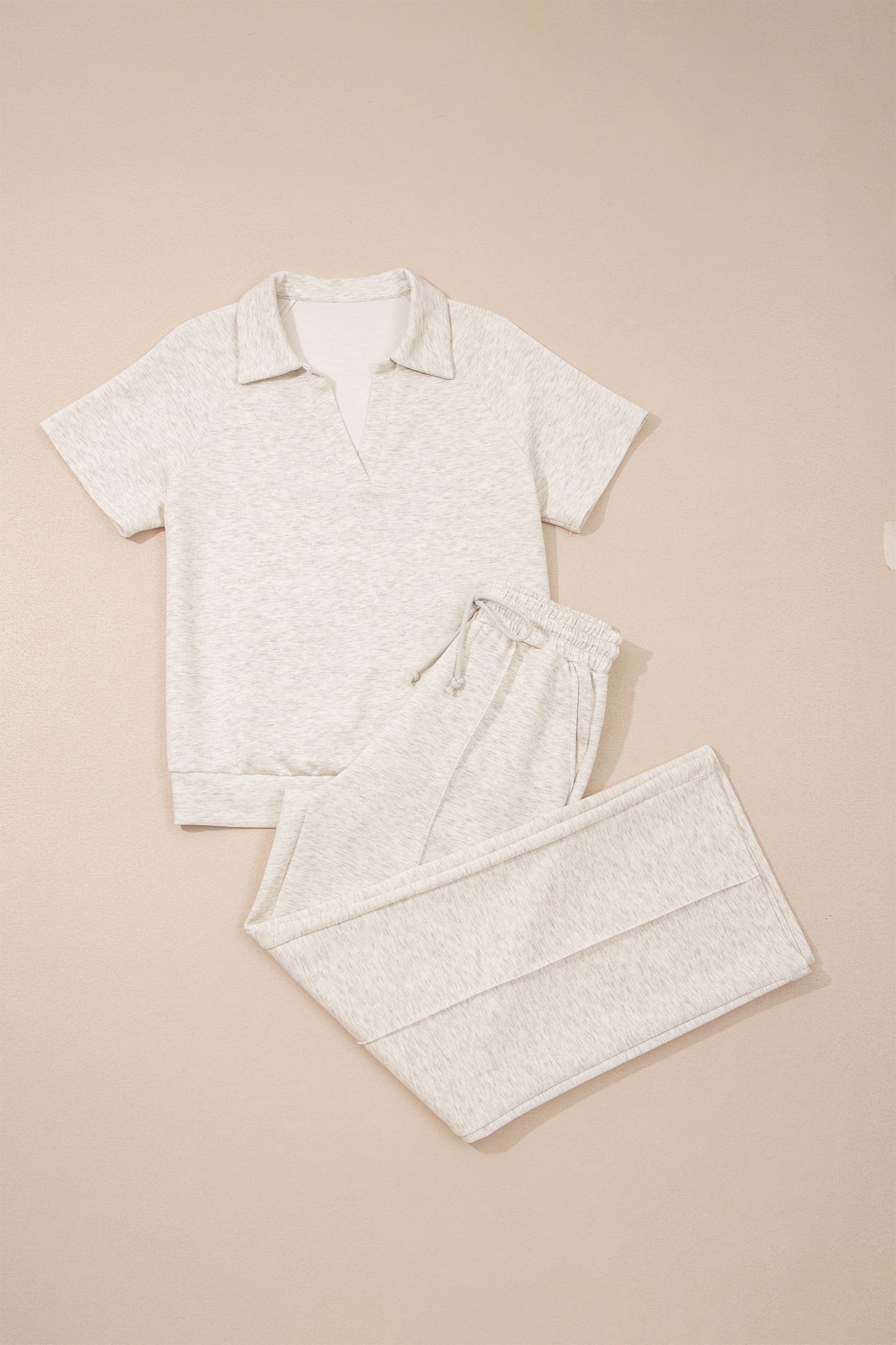 Light grey polo tee and casual pant set by Lavender Lane Clothing, two-piece outfit with comfortable, stylish design.