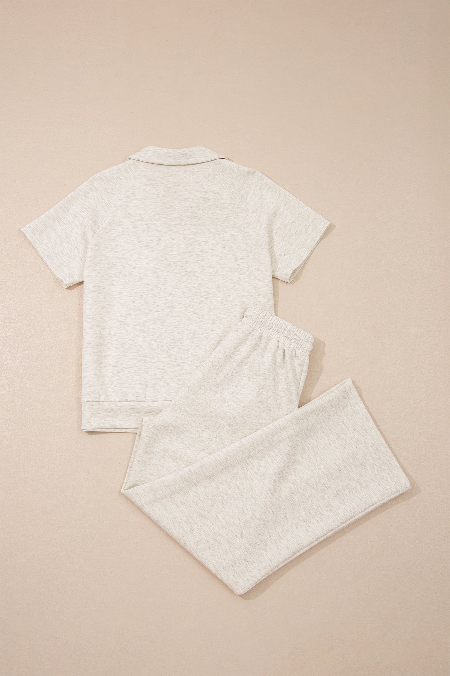 Light grey polo tee and casual pant set from Lavendar Lane Clothing, two-piece outfit featuring a relaxed fit and comfortable fabric.