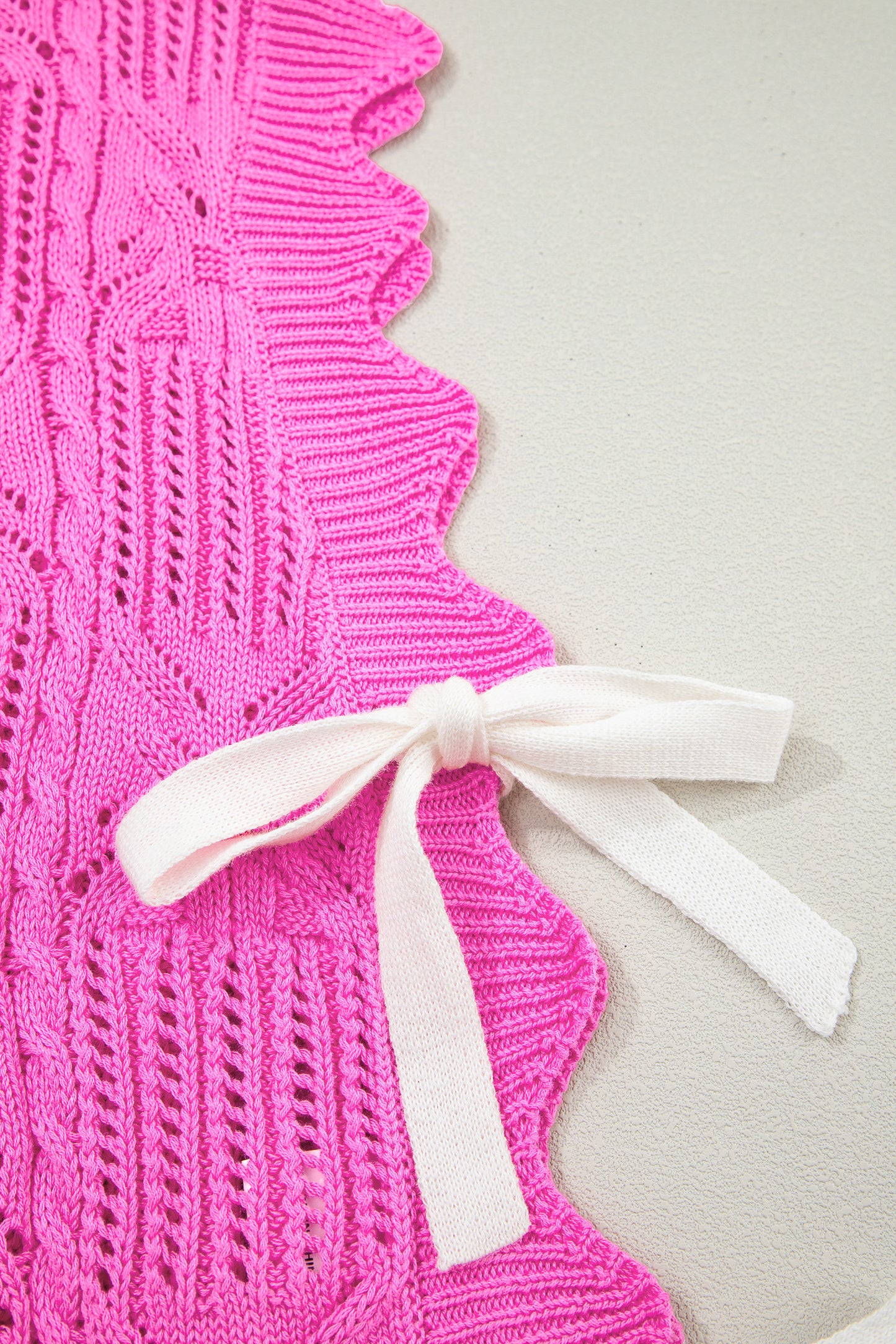 Lavendar Lane Clothing short sleeve sweater with pointelle knit pattern and scalloped trim, perfect for stylish, lightweight layering.