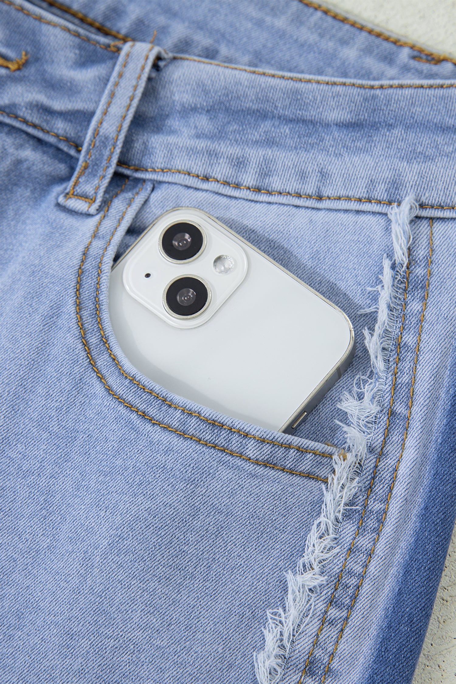 Lavendar Lane Clothing Beau Blue contrast stripe frayed side panel patchwork shift jeans, stylish denim bottoms with unique details.