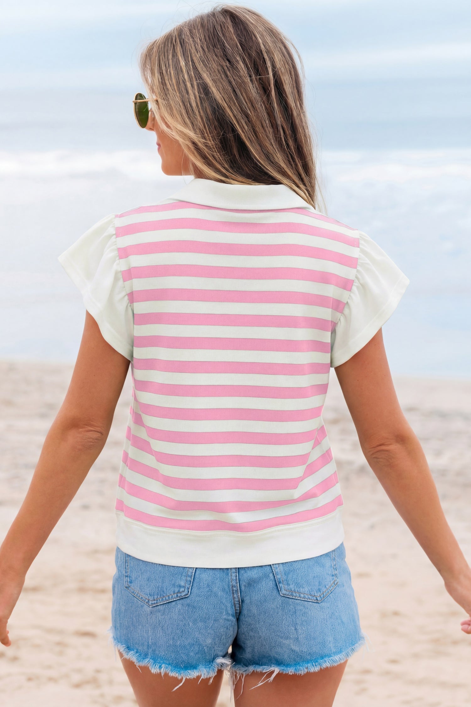 Pink stripe collar V-neck ruffled short sleeve blouse by Lavendar Lane Clothing, featuring a stylish and feminine design.