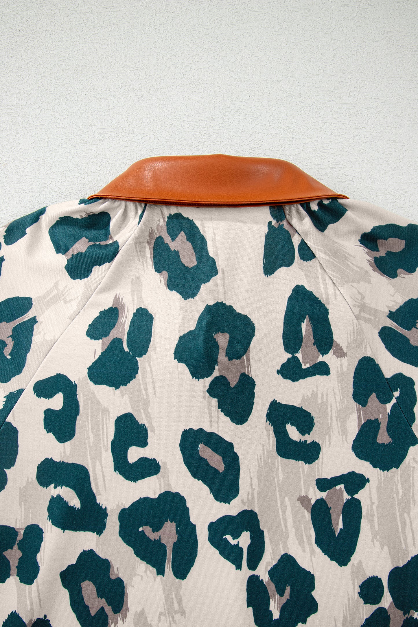Lavendar Lane Clothing casual leopard print blouse with contrast collar, short sleeves, and button front, stylish and unique.