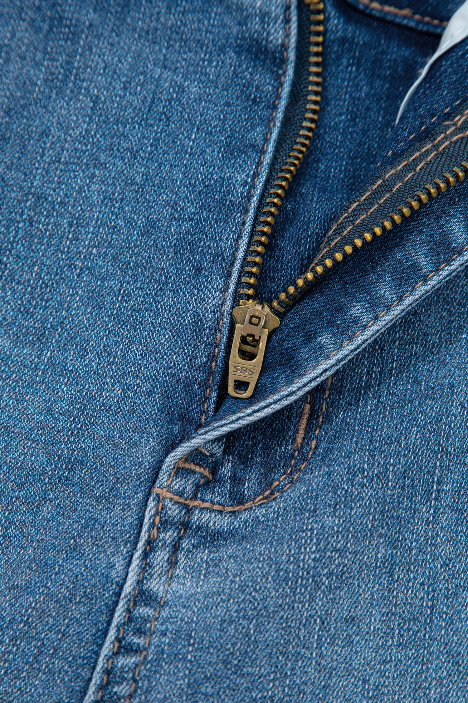 Lavendar Lane Clothing Sail Blue straight jeans with exposed stitching, showcasing a classic denim look and slim fit design.