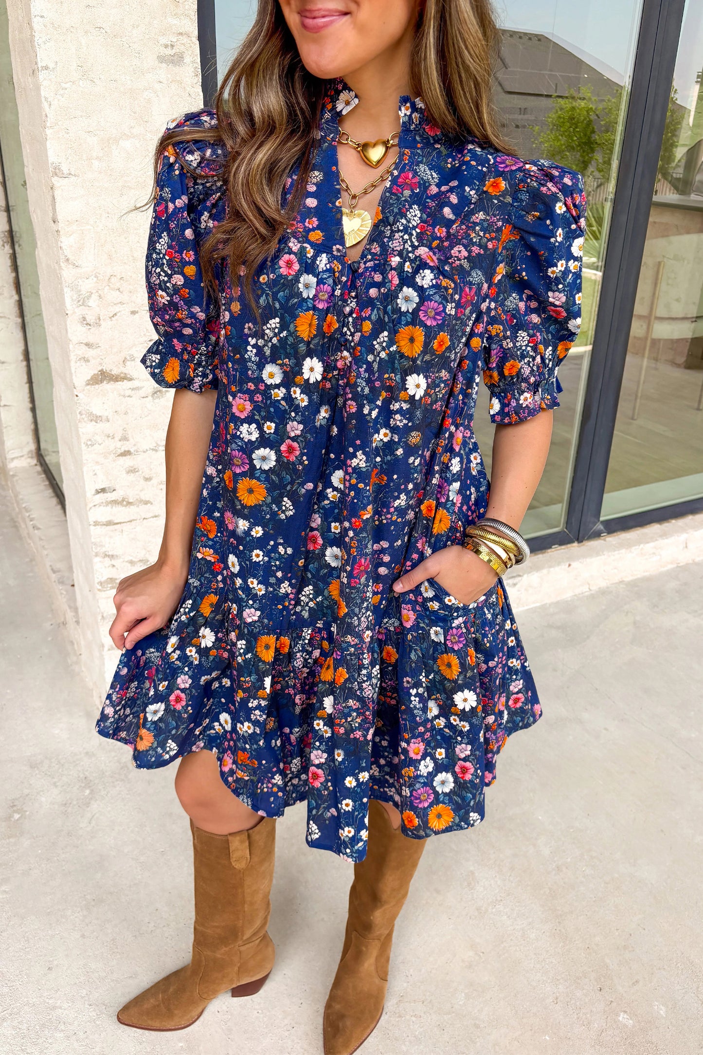 Blue Wild Daisy floral mini dress by Lavendar Lane Clothing featuring a split neckline and short puff sleeves.