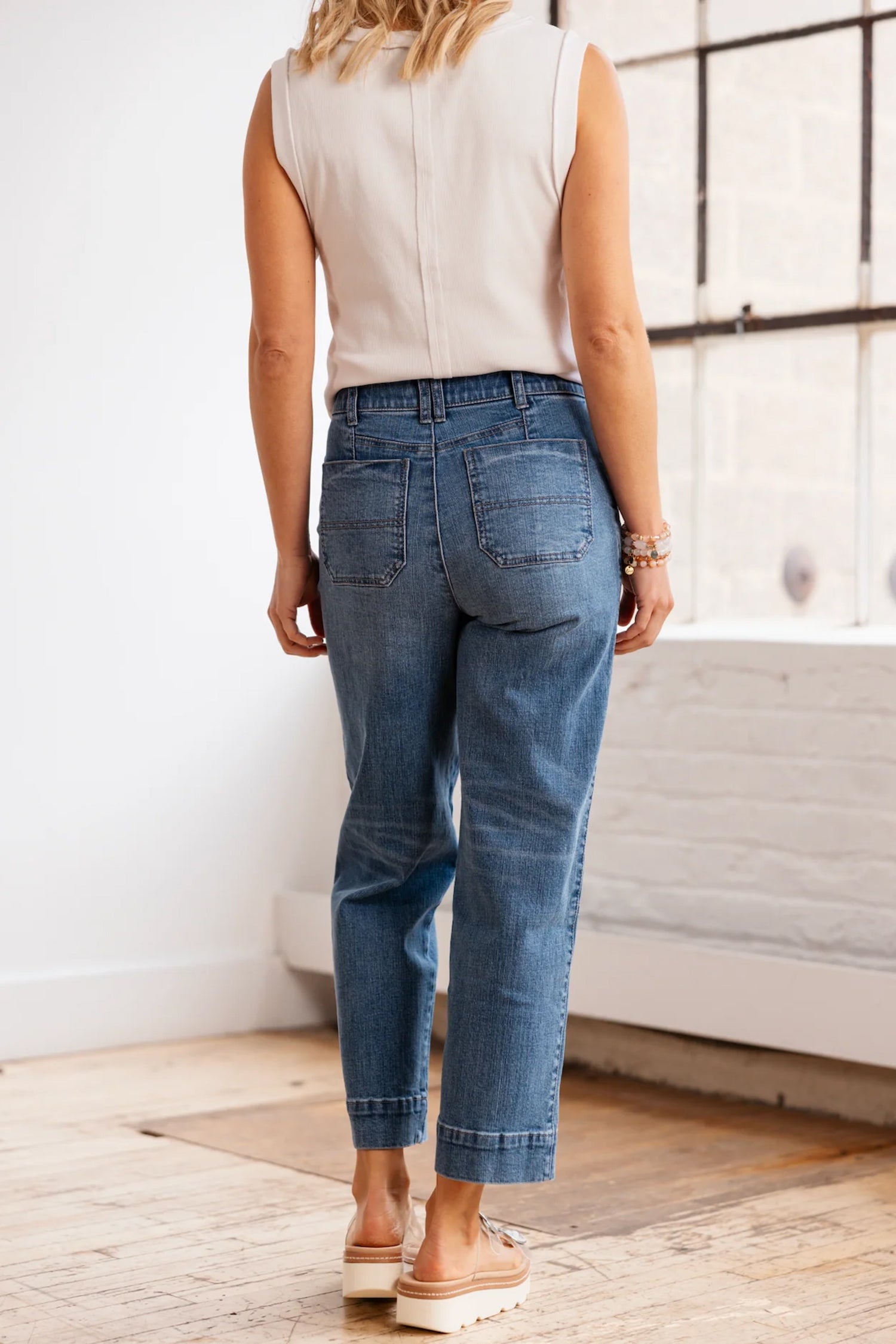 Lavendar Lane Clothing Sail Blue straight jeans with exposed stitching, classic denim bottoms, slim fit, casual style.