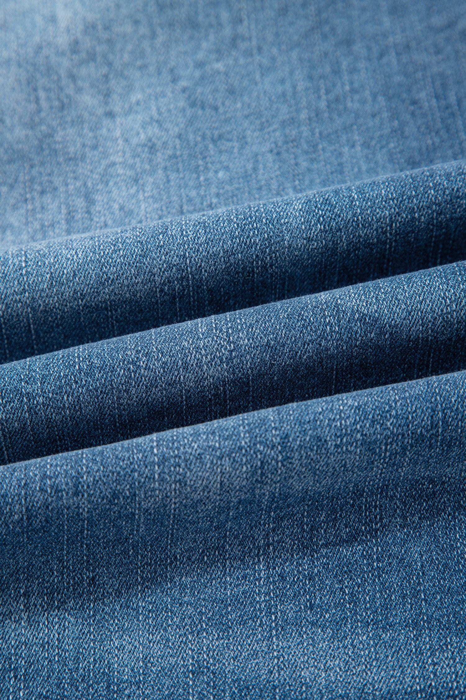 Lavendar Lane Clothing Sail Blue straight jeans with exposed stitching, classic denim bottoms, casual and stylish design.