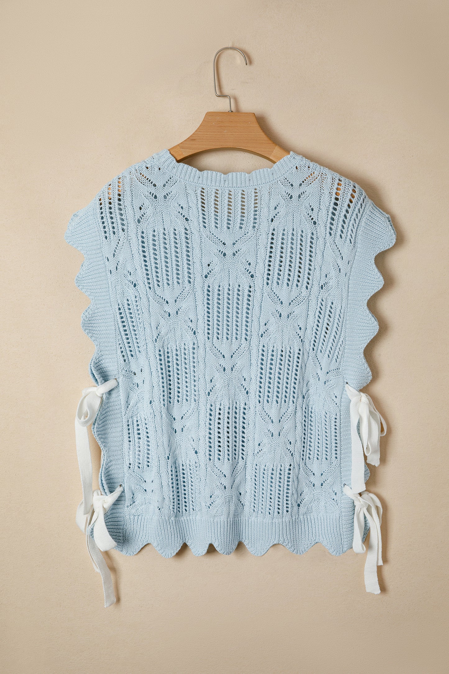 Lavendar Lane Blue Pointelle knit short sleeve sweater with scalloped trim, featuring a patterned design and classic fit.