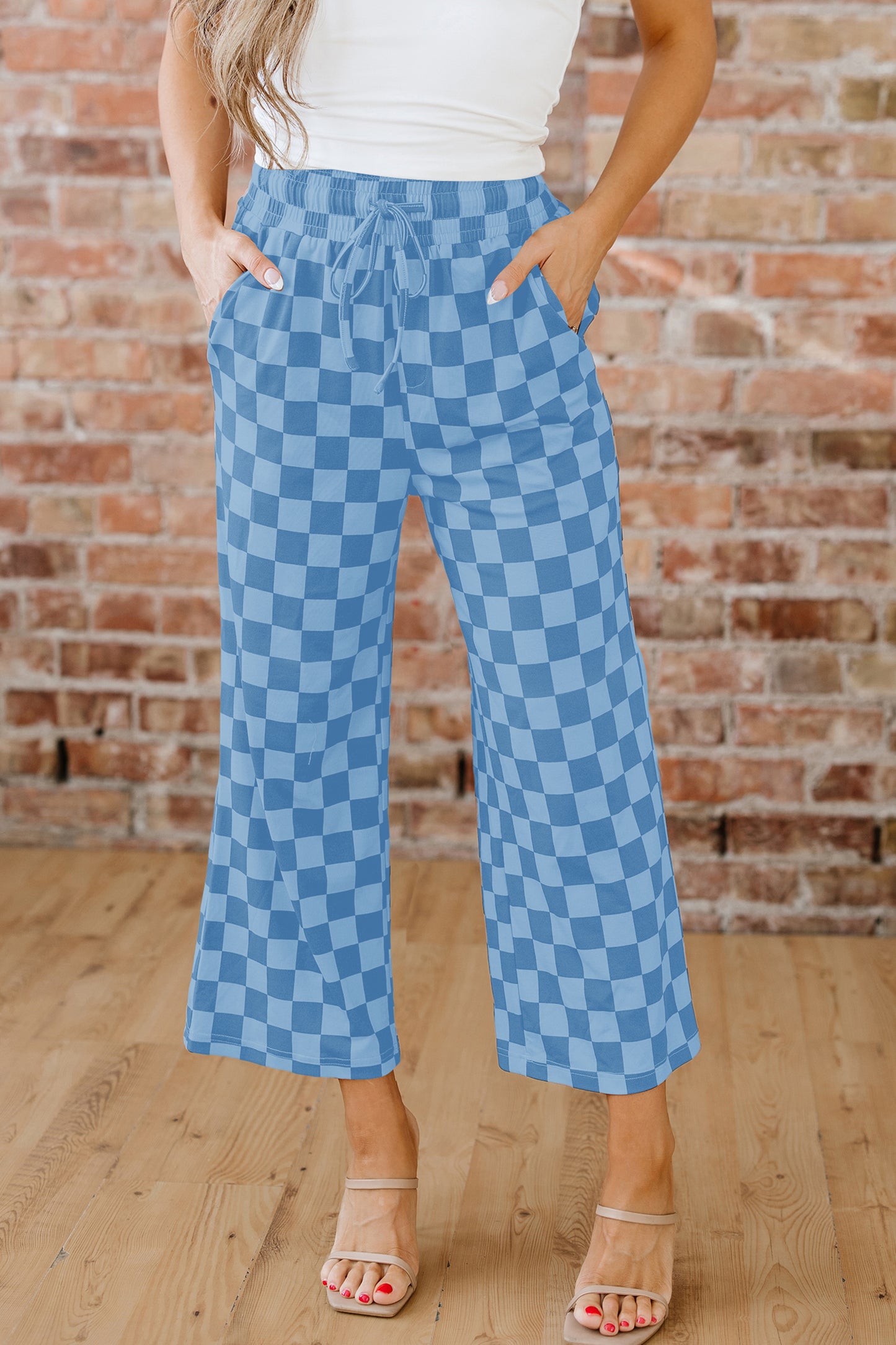 Sky blue checkered elastic high-waist casual pants from Lavendar Lane Clothing, featuring a loose fit and stylish culotte design.