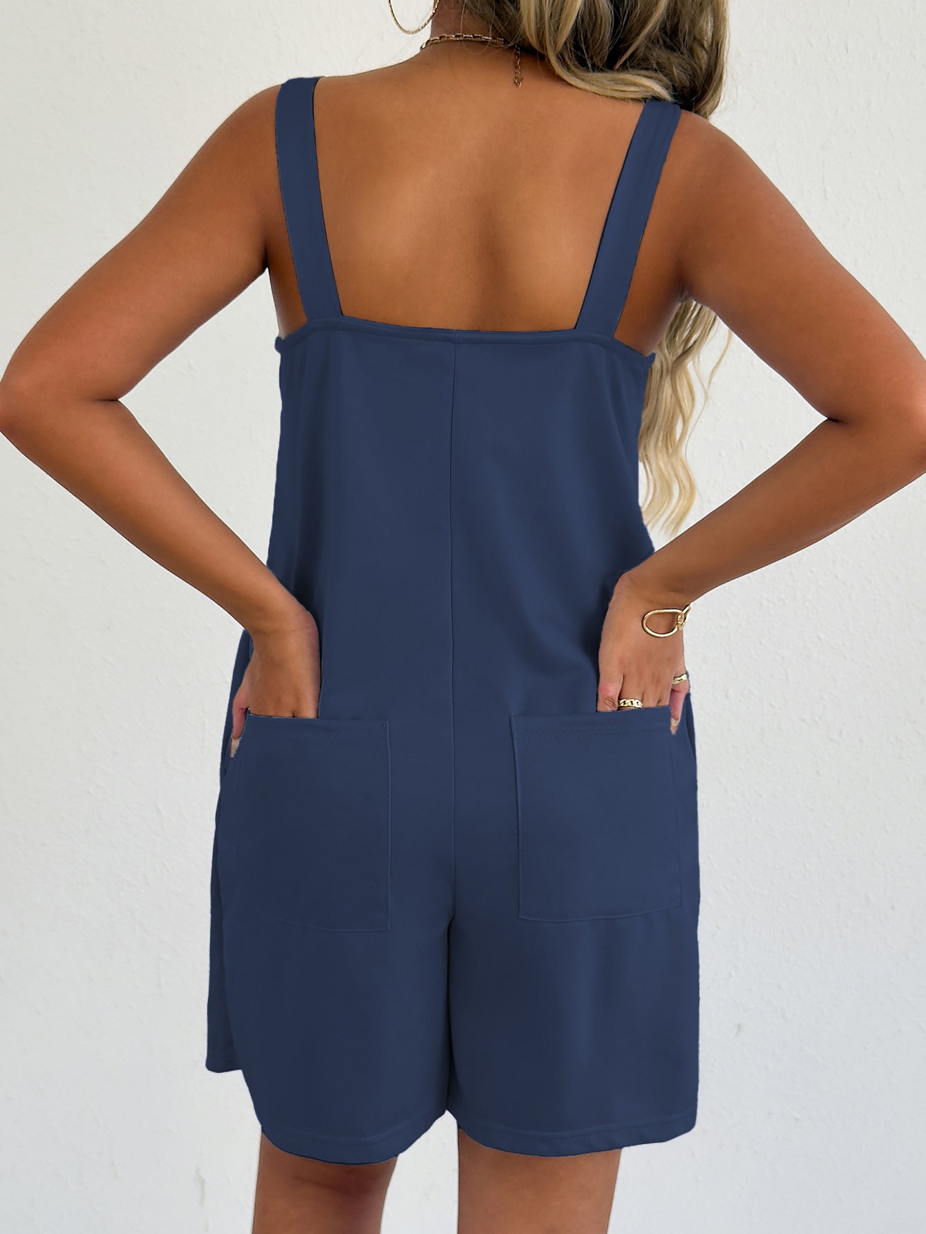 Lavendar Lane Clothing sleeveless casual romper with side pockets, lightweight and comfortable for warm weather.