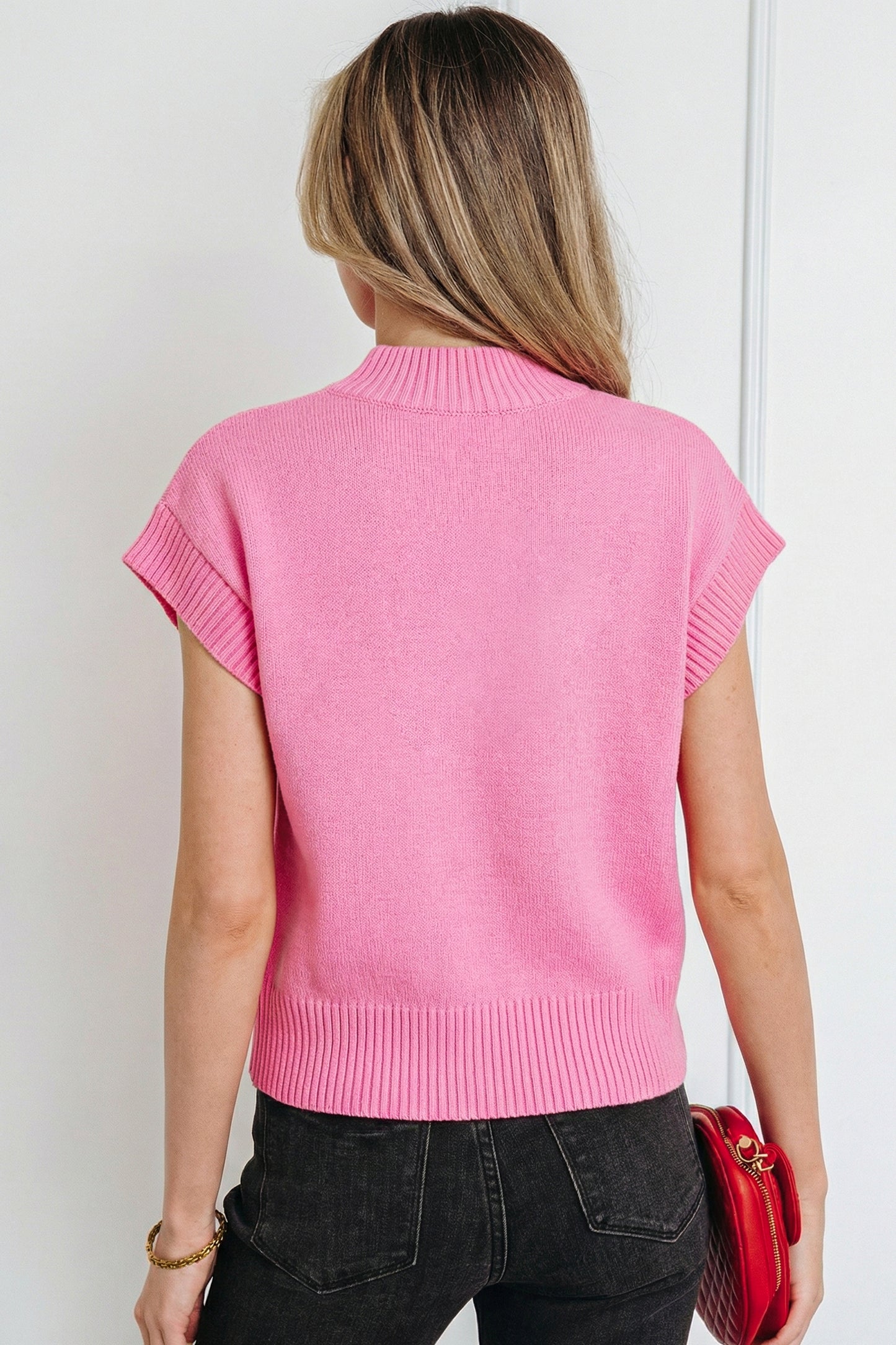 Pink Valentine heart graphic cropped short sleeve sweater by Lavendar Lane Clothing, featuring a playful heart design and soft knit fabric.