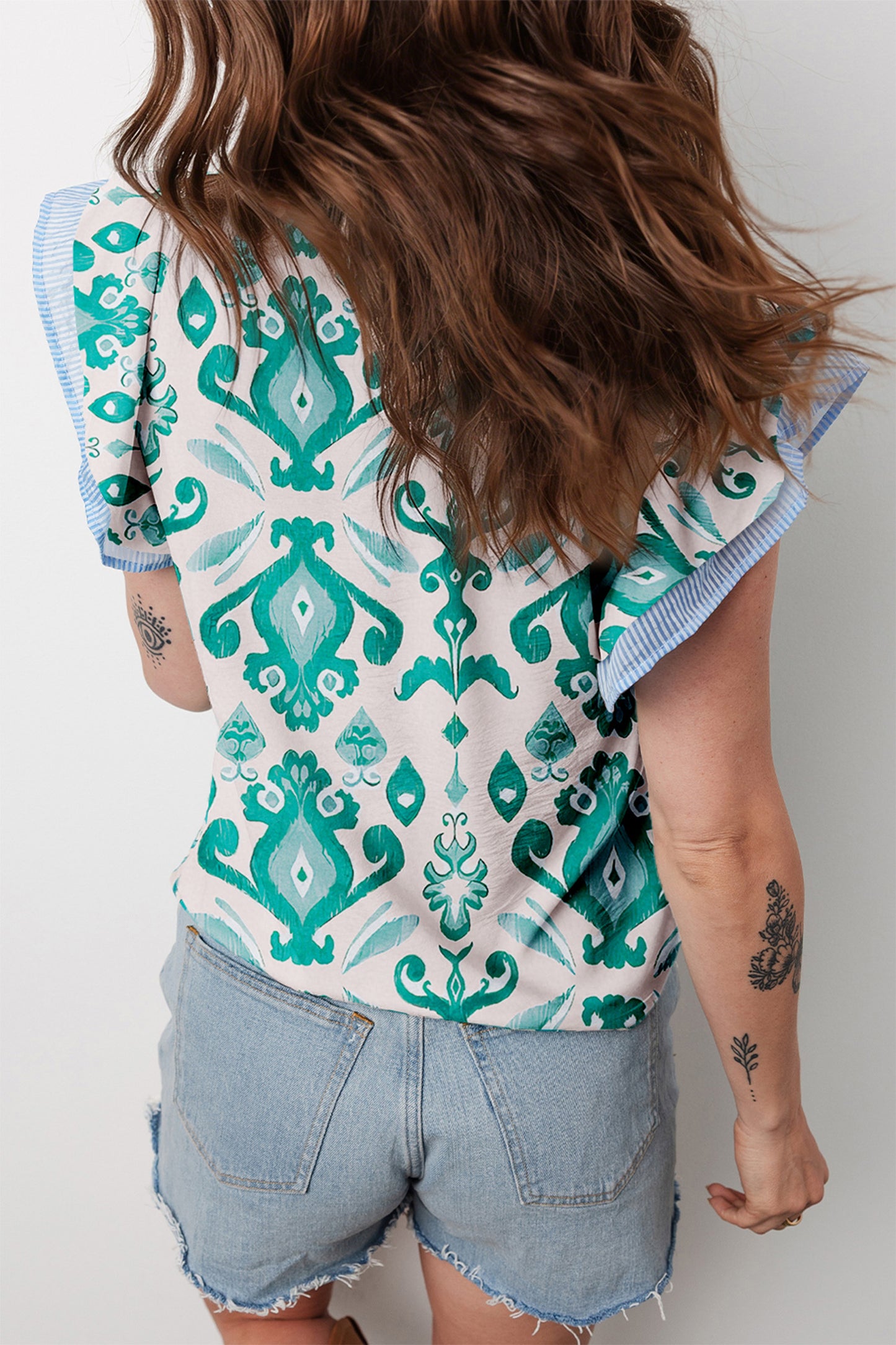 Sky blue ethnic print striped trim flutter sleeve top by Lavendar Lane Clothing, featuring a relaxed fit and vibrant design.